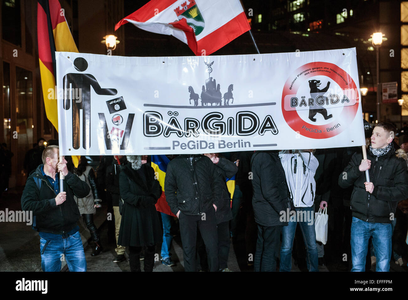 Berlin, Germany. 2nd Feb, 2015. Members of the anti-Islamic group Baergida (Berlin Patriots against the Islamization of the west) carry a banner which reads 'Baergida - Pegida Berlin' during a rally in Berlin, Germany, 2 February 2015. The Baergida group is an offshoot of the Pegida group (Patriotic Europeans against the Islamization of the West). Photo: Paul Zinken/dpa/Alamy Live News Stock Photo