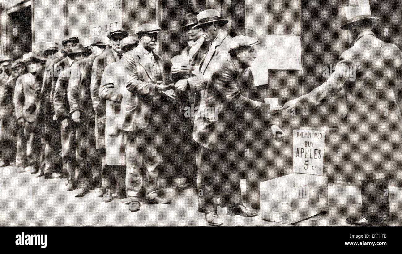 A line of unemployed men buy apples for 5 cents during the Great Depression of America. Stock Photo