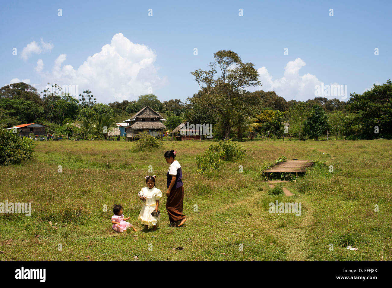 Family and Houses In The Ngobe Bugle Indian Village Of Salt Creek Near