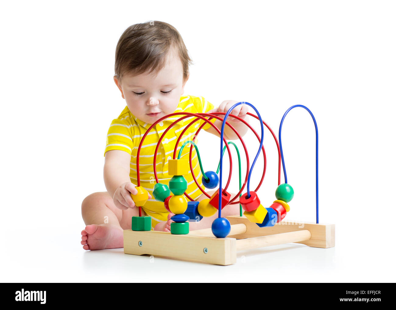 baby boy playing with educational toy Stock Photo - Alamy
