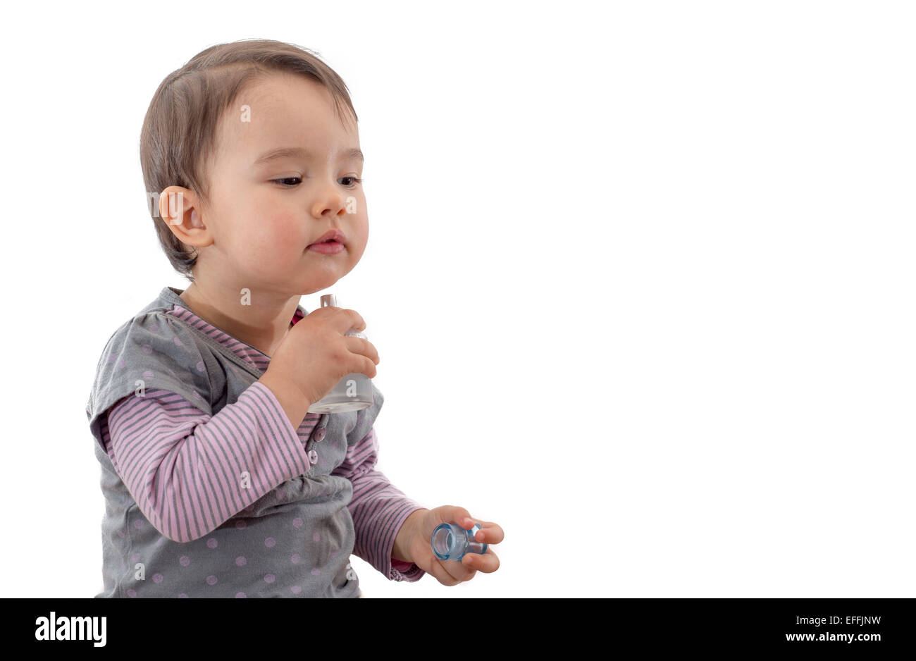 toddler with perfume Stock Photo Alamy