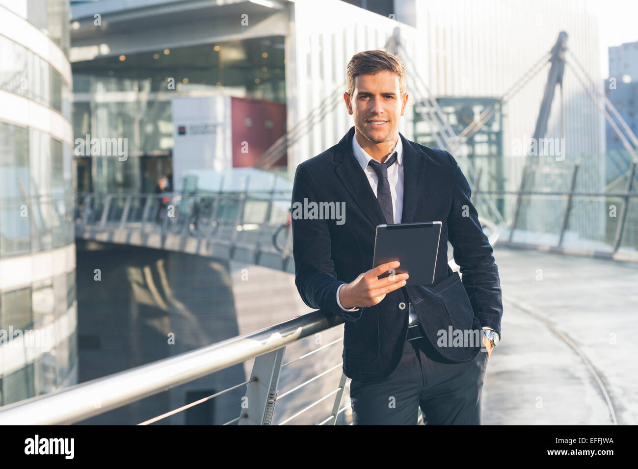 Businessman using a digital tablet Stock Photo