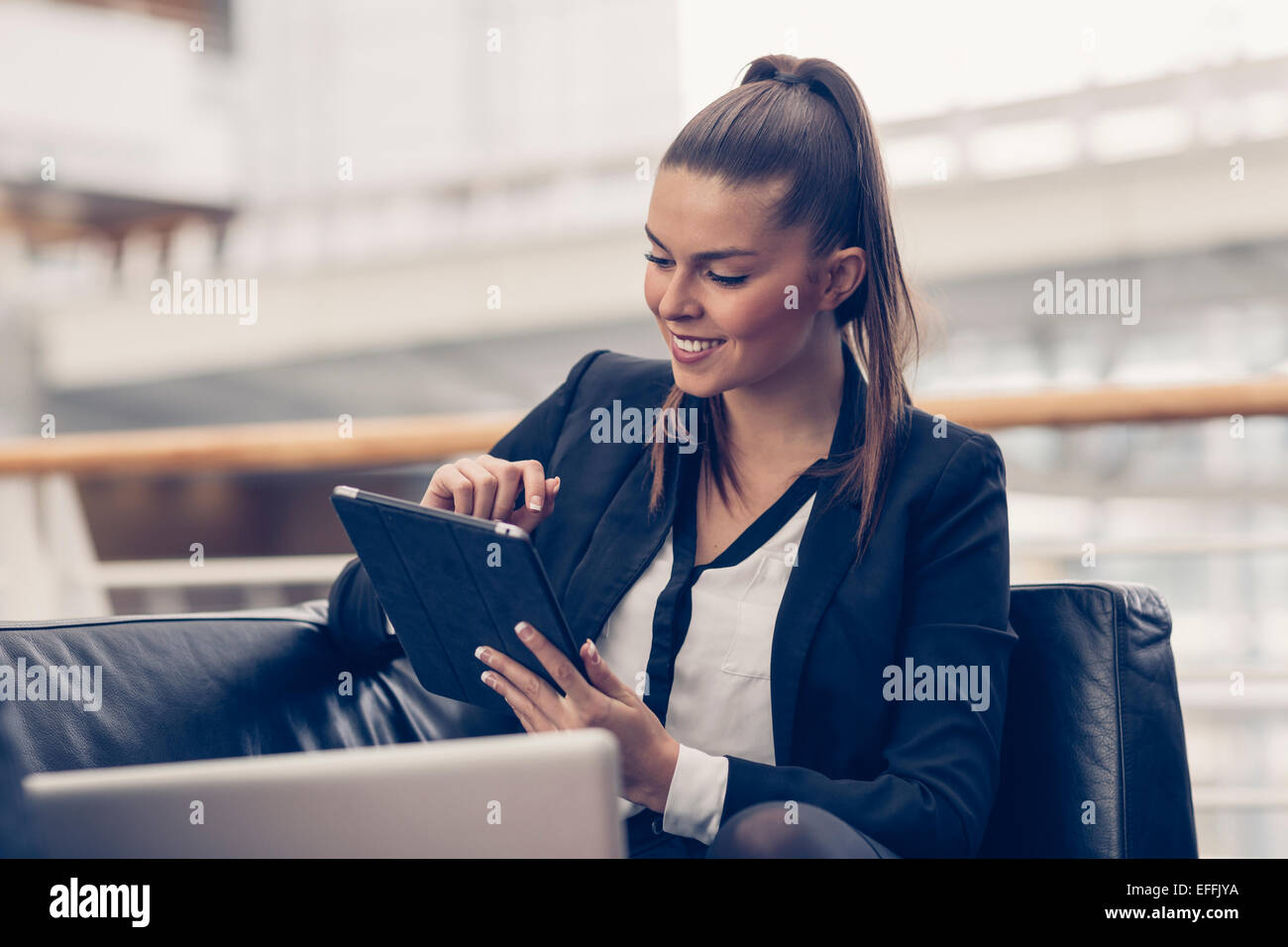 Portrait of a businesswoman with a digital tablet Stock Photo