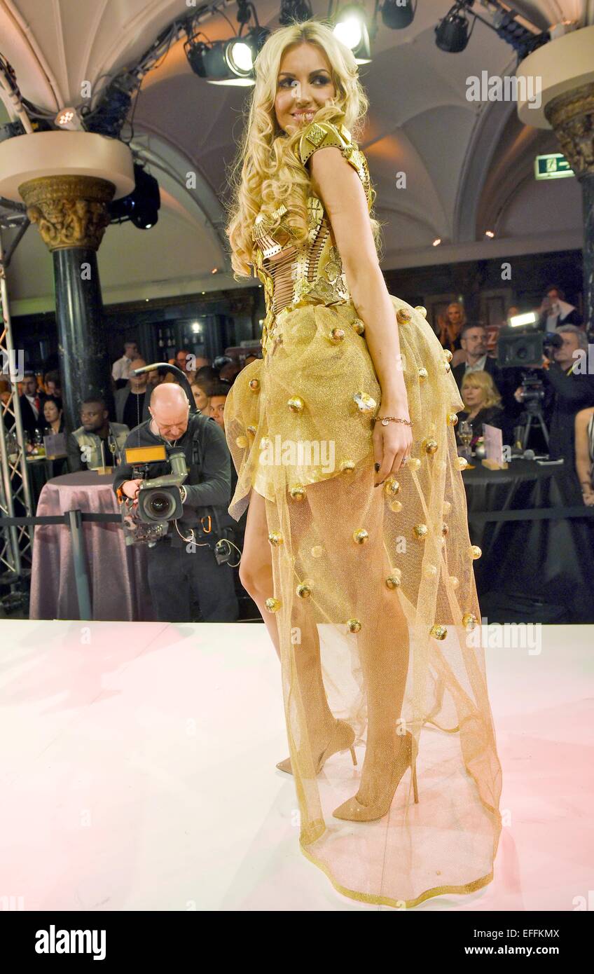 Cologne, Germany. 2nd Feb, 2015. Irish model Rosanna Davison stands on stage wearing a dress decorated with chocolate during the Lambertz Monday Night in Cologne, Germany, 2 February 2015. Models presented fashion creations decorated with chocolate during the 'Chocolate and Fashion' show, sponsored by chocolate manufacturer Lambertz. Photo:Henning Kaiser/dpa/Alamy Live News Stock Photo