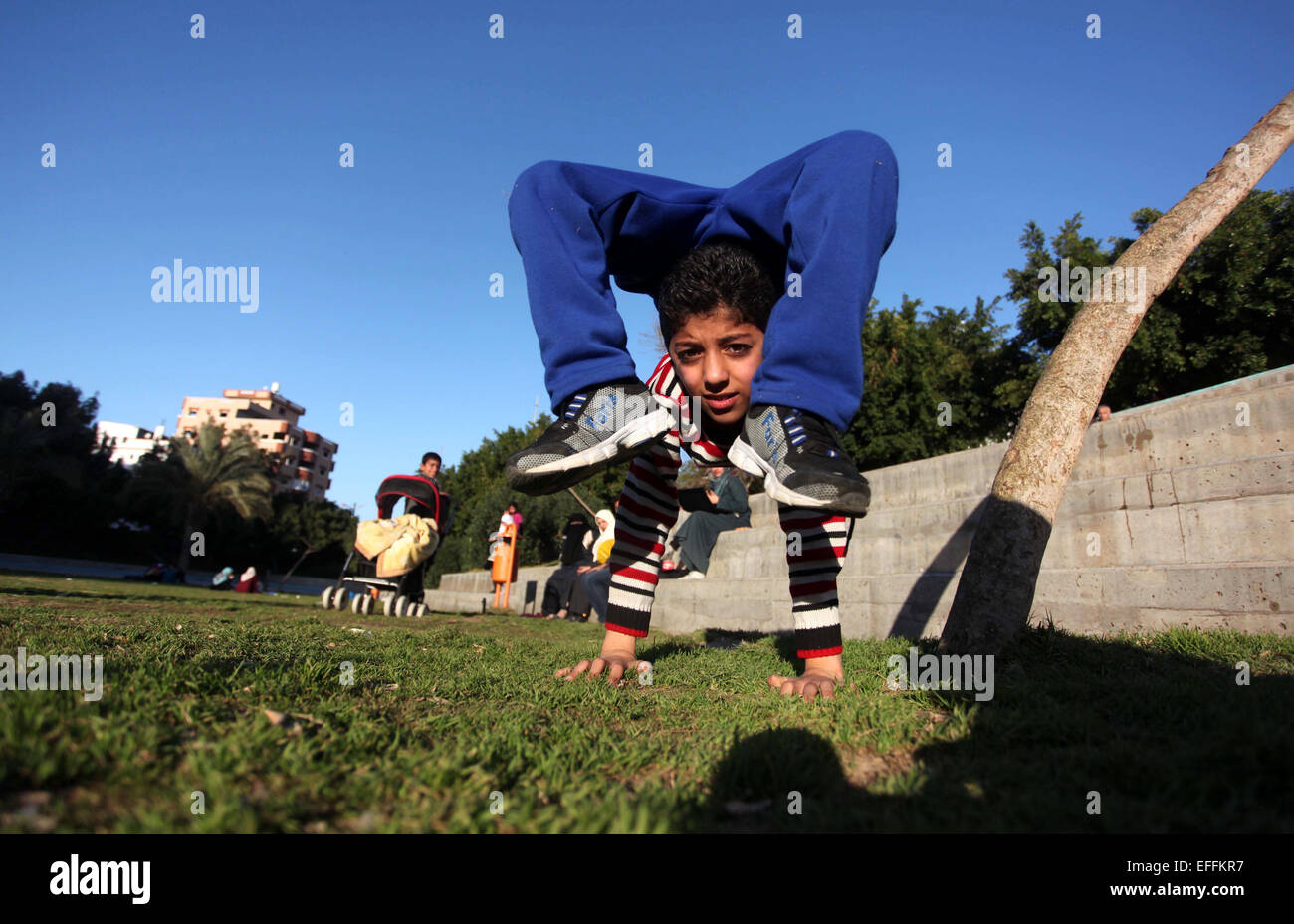 Feb. 3, 2015 - Gaza City, Gaza Strip - MOHAMMED EL-SHEIKH, a 11-year-old Palestinian boy, demonstrates his skills in Gaza City. El-sheikh is extremely flexible and has been training for only a year without any professional help. He is hoping for stardom after his success in in the hugely popular ''Arabs Got Talent'' TV show in Beirut last month. (Credit Image: © Ashraf Amra/APA Images/ZUMA Wire) Stock Photo