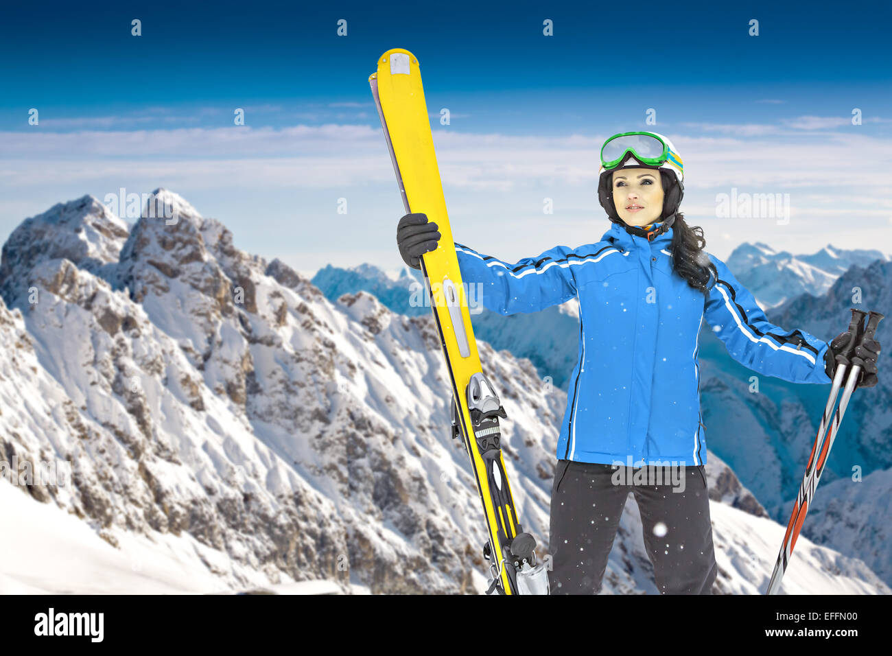 A woman skiing on the ski run in the Alps Stock Photo