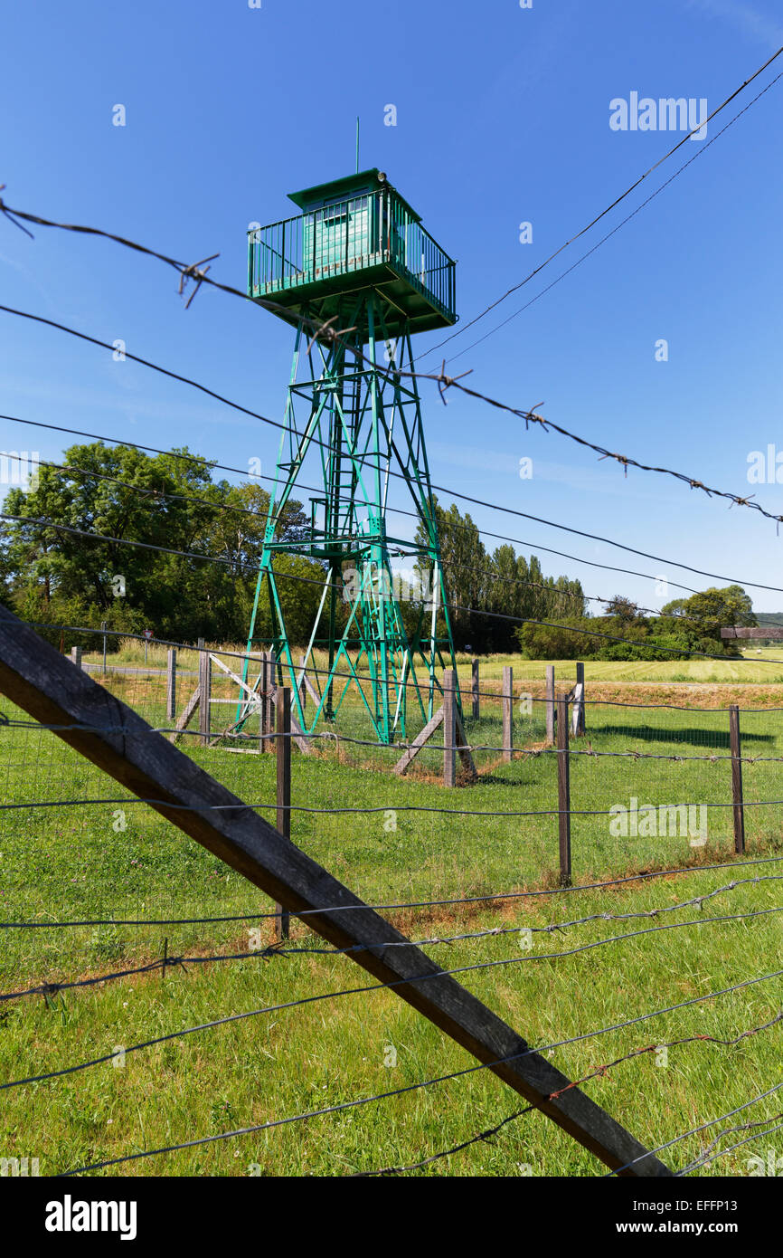 Austria, Burgenland, Bildein, view to watchtower behind barbed wire fence Stock Photo