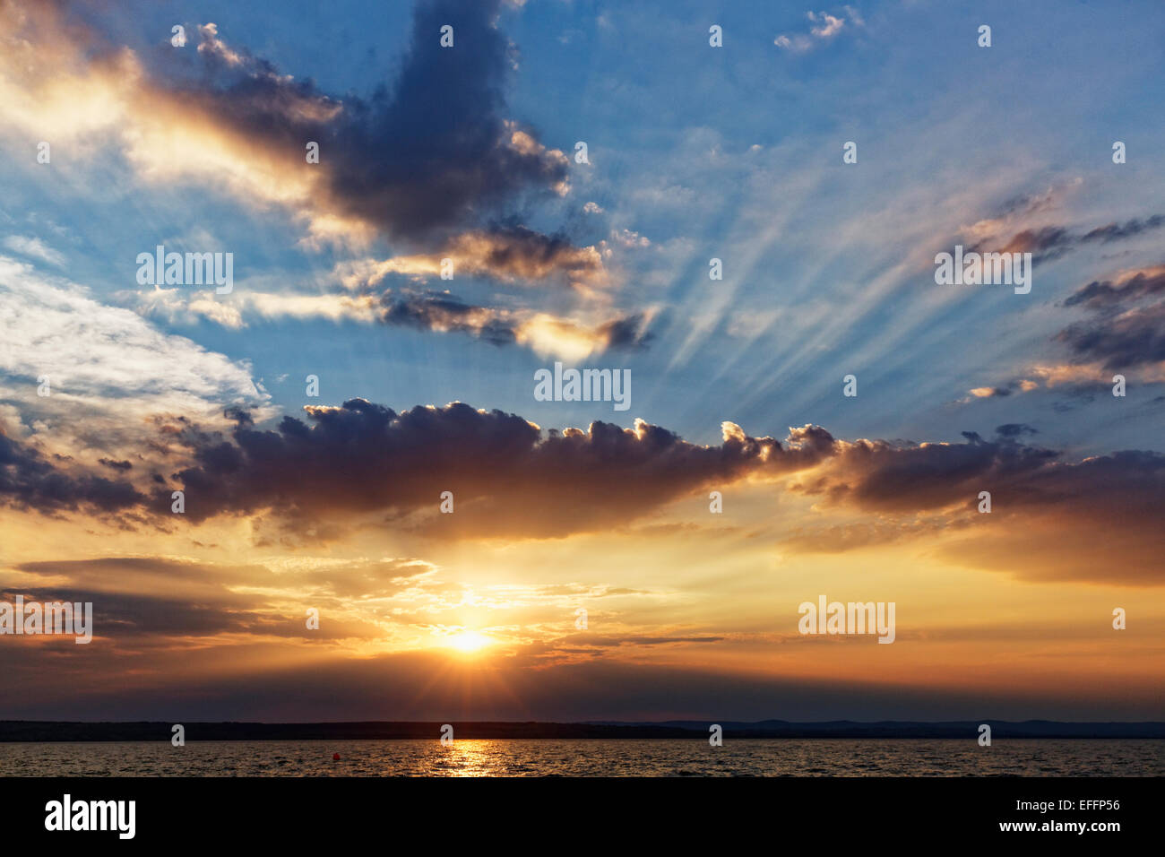 Austria, Burgenland, Illmitz, Lake Neusiedl at sunset Stock Photo