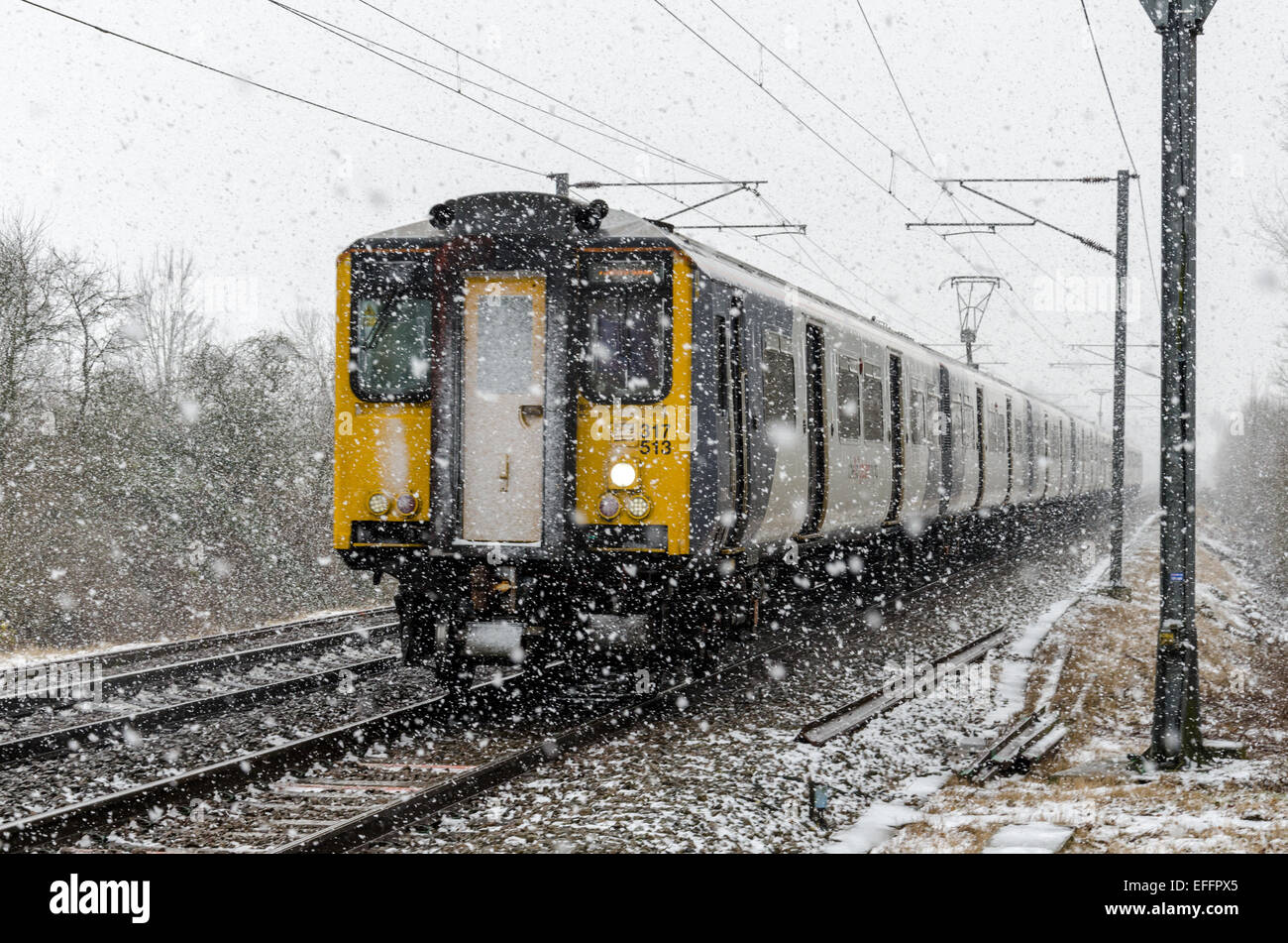 Train in snowy conditions Stock Photo