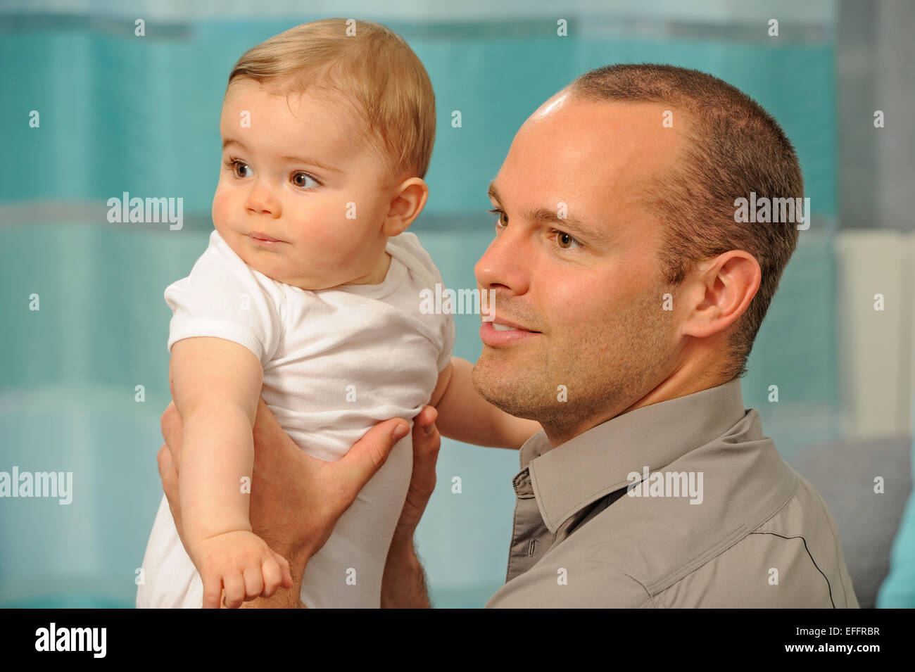 Father playing with his little baby. Quality time father and daughter. Stock Photo
