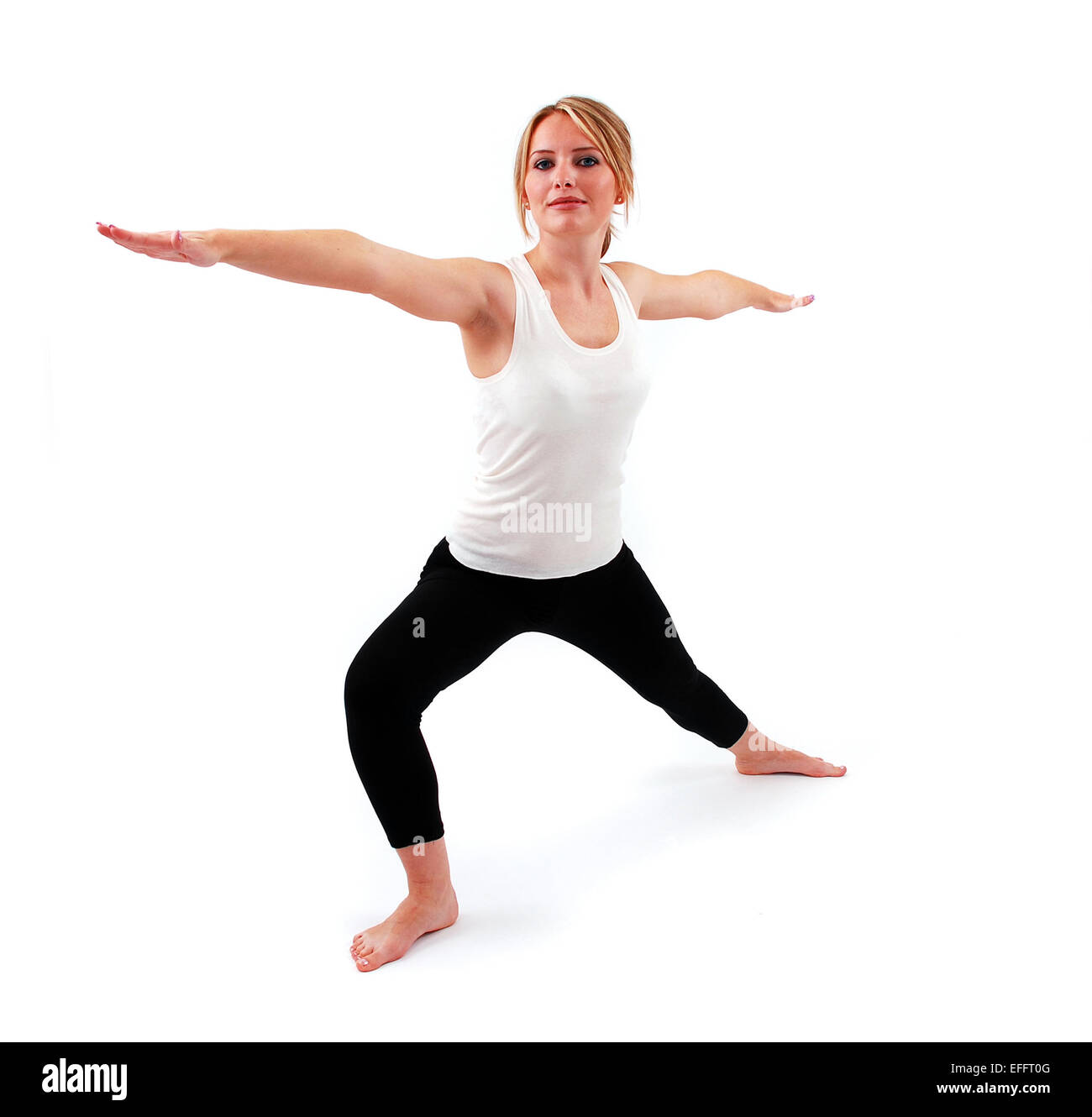 Beautiful girl practicing yoga on isolated white background Stock Photo ...