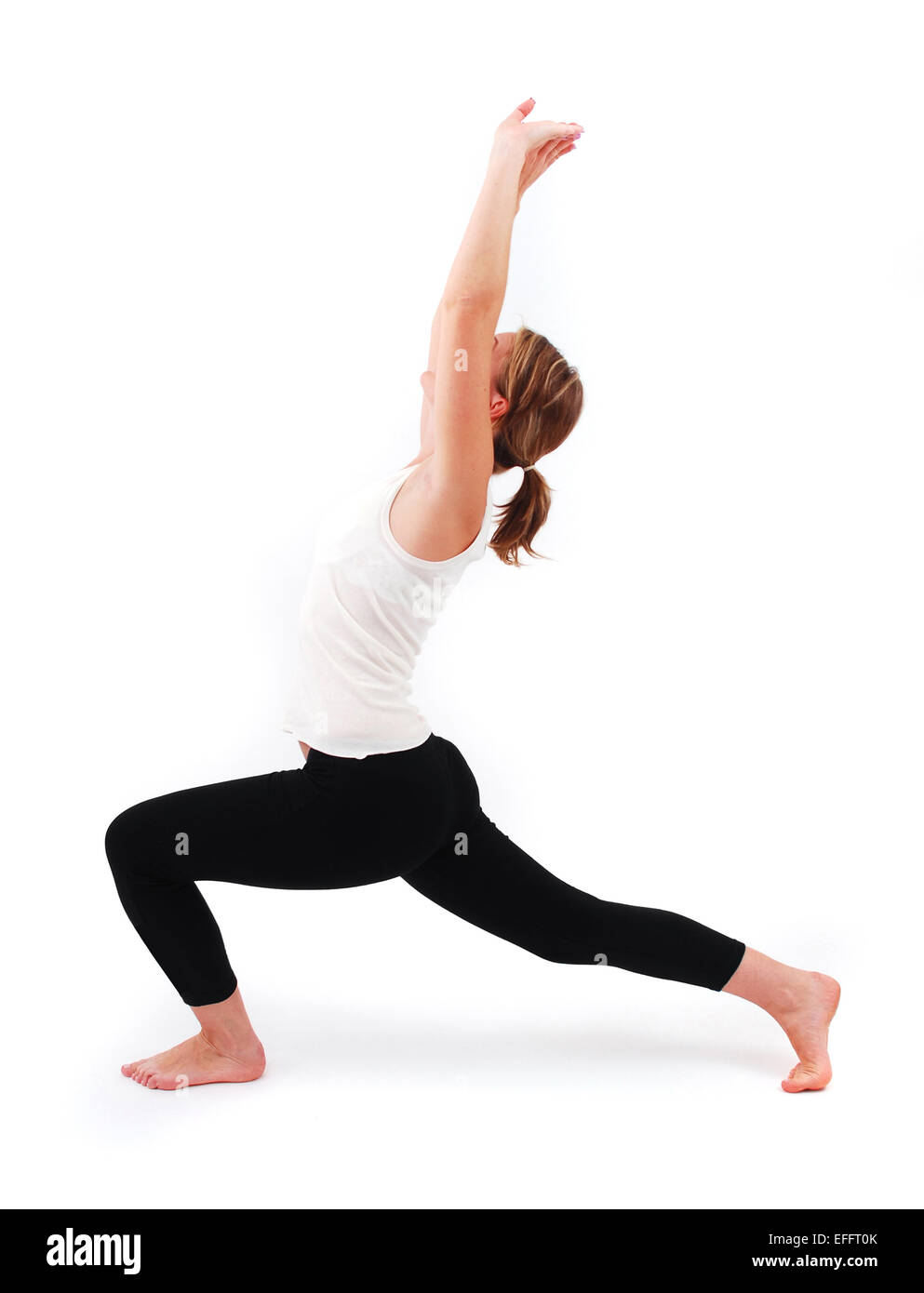 Beautiful girl practicing yoga on isolated white background Stock Photo ...