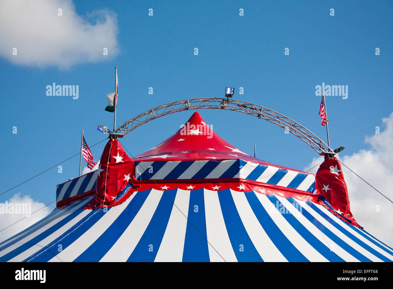 Uncle Sam's Great American Circus big top against a blue sky. Stock Photo