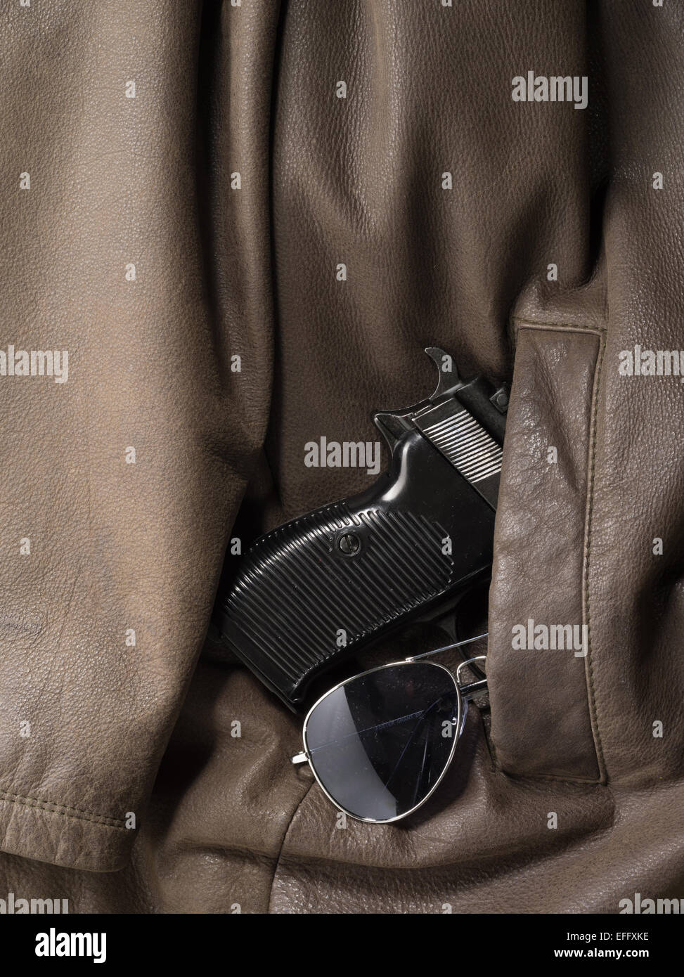 Walther P38 pistol in coat pocket with sunglasses Stock Photo Alamy