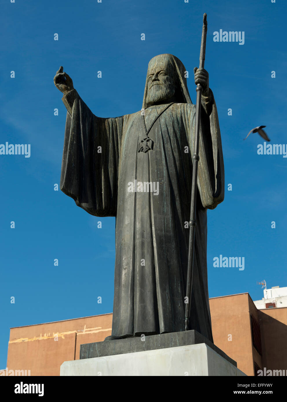 Greek Priest statue in Plateia Mitropoleos outside of the Metropolitan Cathedral of Athens, Athens, Greece. Stock Photo