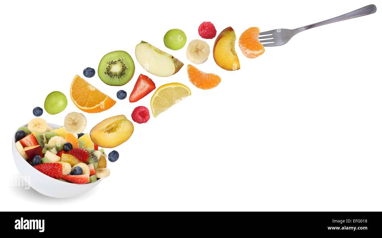 Eating flying fruit salad with fork, fruits like apples, oranges, kiwi, peach, banana and