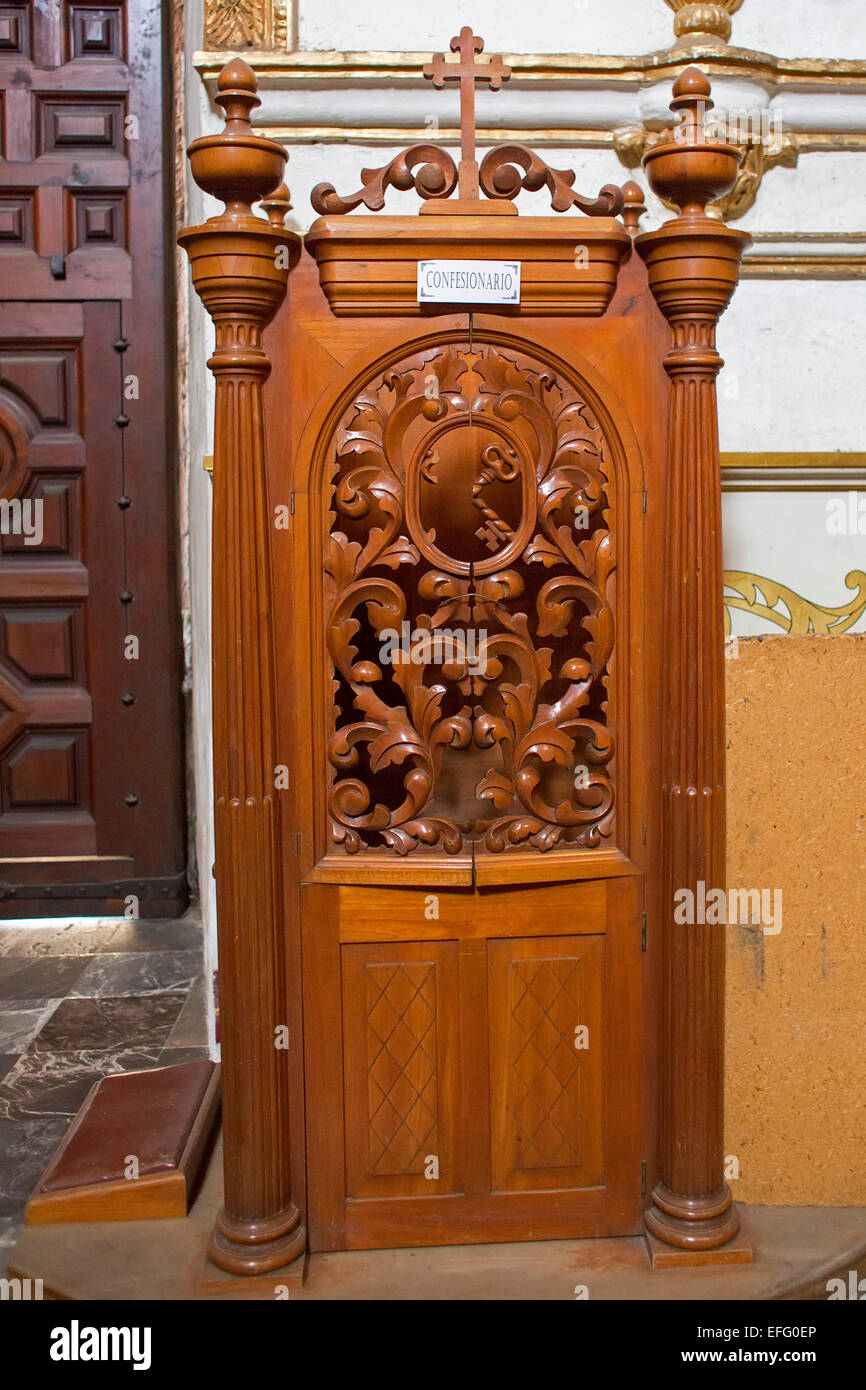 Oaxaca, Mexico - A confessional at Santo Domingo de Guzmán Catholic church. Stock Photo