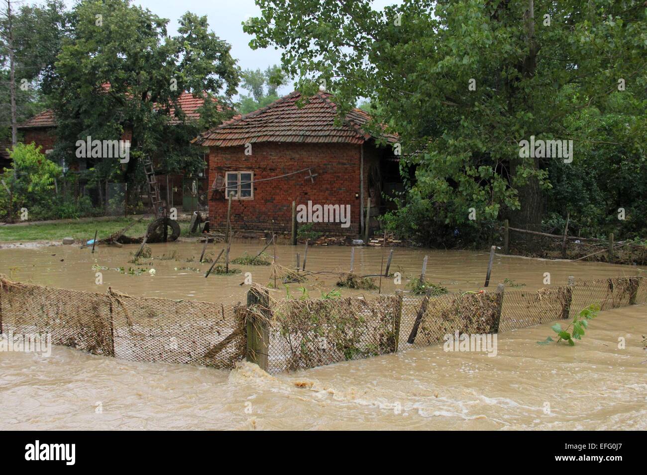 Heavy rains and haill storms hit the town of Nevianin north-east of the Bulgarian capital Sofia and several other areas at south-east Bulgaria , Friday, Aug, 01, 2014. The heavy rain leaving hundreds of destroyed homes and cars under the water, causing co Stock Photo