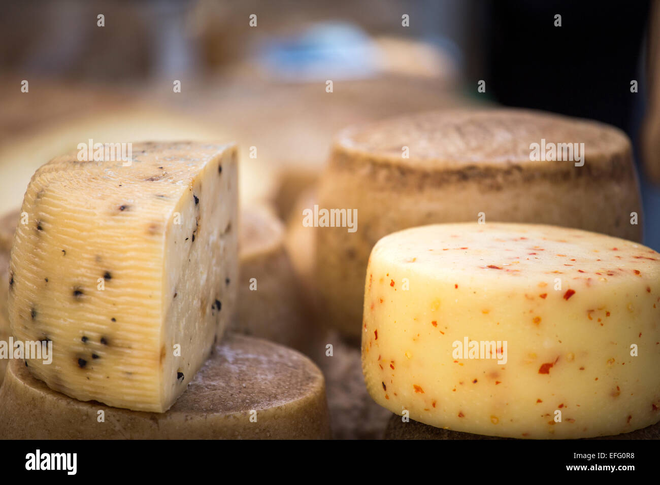 block of italian cheese on a market stall, Rome, Italy Europe Stock Photo