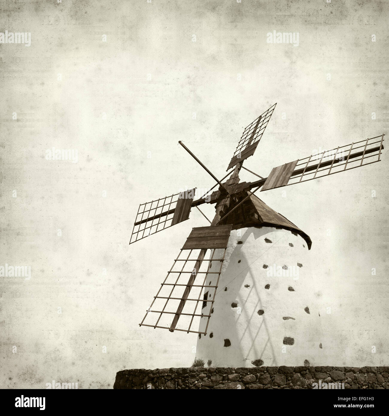 textured old paper background with traditional round windmill, molino ...