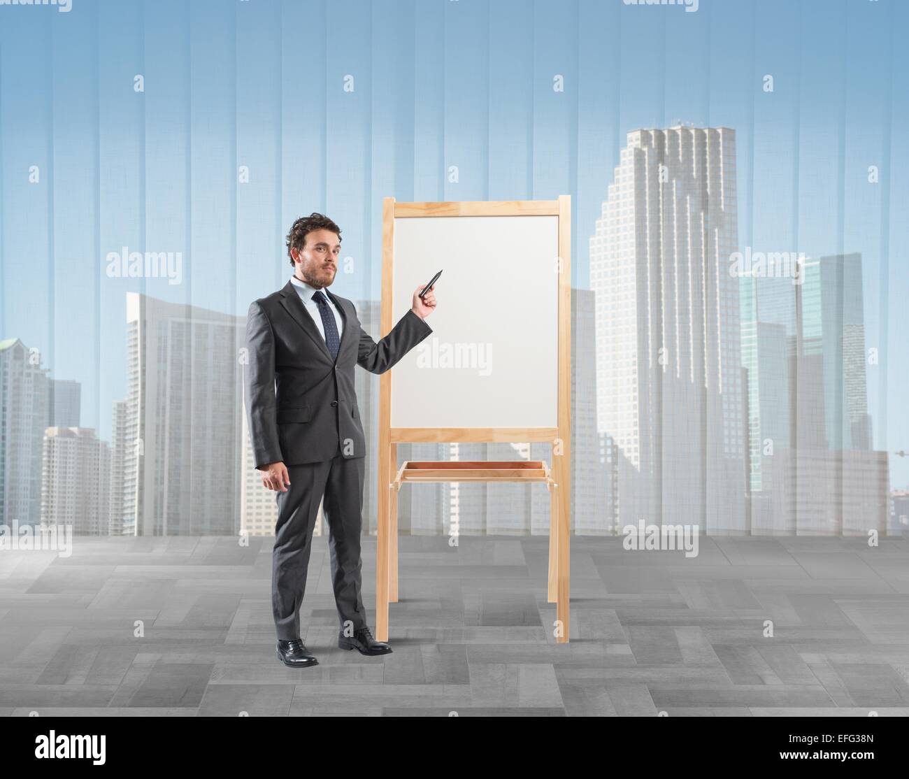 Businessman shows and explains Stock Photo - Alamy