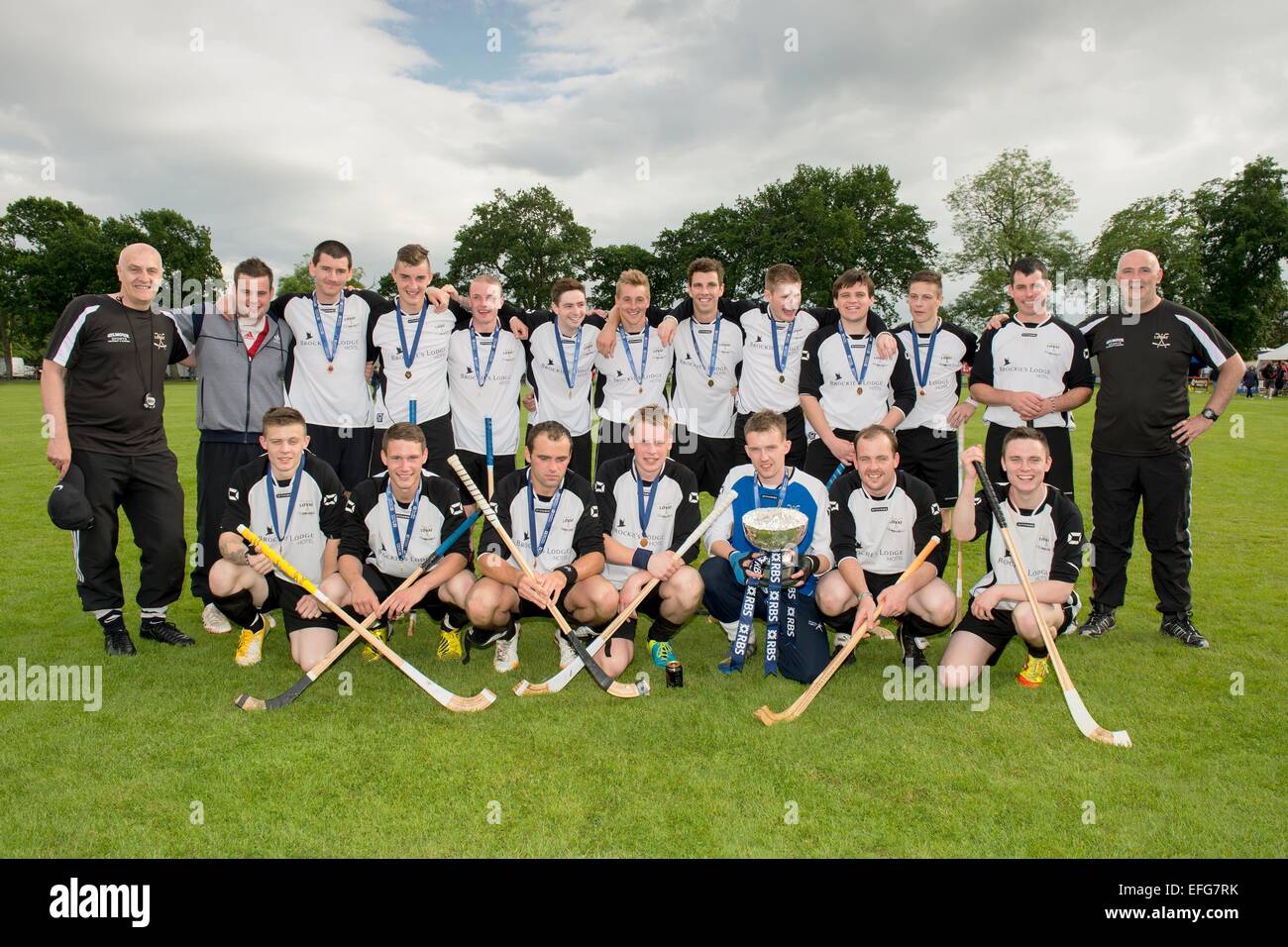 The victorious Lovat team with the MacTavish Cup.  Final between Lovat v Glenurquhart played at The Bught, Inverness, 2014. Stock Photo