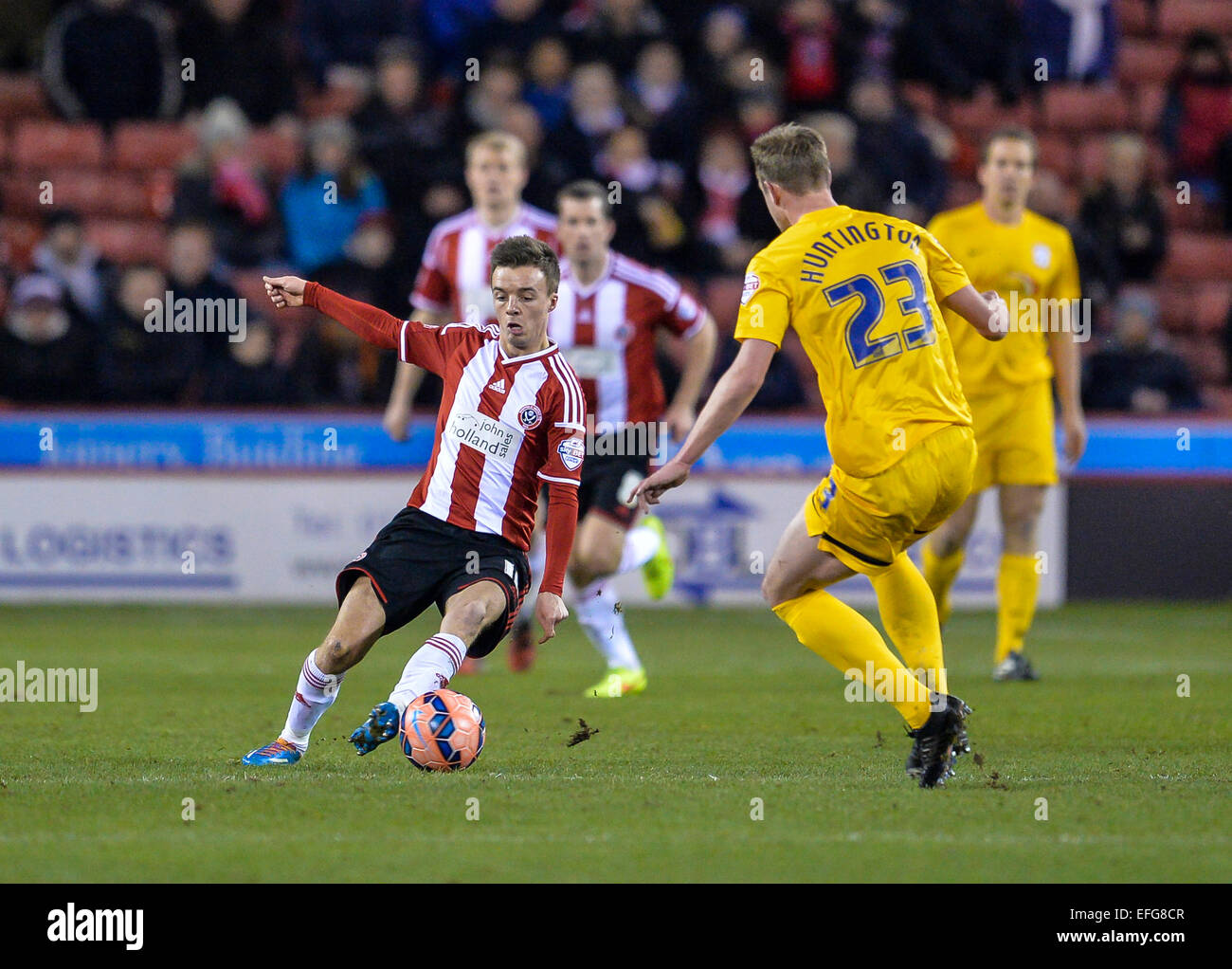 Sheffield, UK. 03rd Feb, 2015. FA Cup 4th Round Replay. Sheffield United versus Preston North End. Stefan Scougall (10) of Sheffield United moves the ball around Paul Huntington (23) of Preston North End. Credit:  Action Plus Sports/Alamy Live News Stock Photo