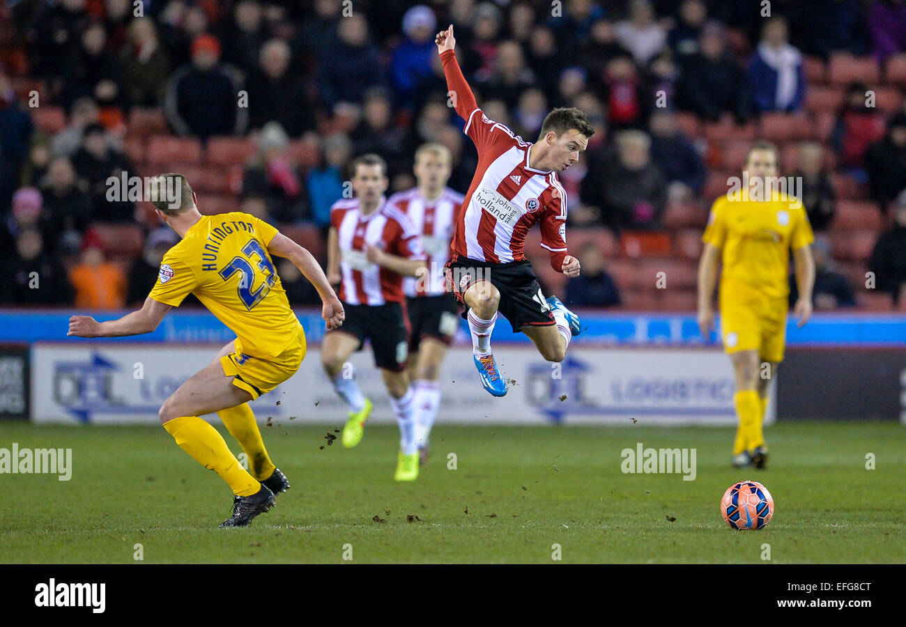 Sheffield, UK. 03rd Feb, 2015. FA Cup 4th Round Replay. Sheffield United versus Preston North End. Stefan Scougall (10) of Sheffield United leaps over a challenge from Paul Huntington (23) of Preston North End. Credit:  Action Plus Sports/Alamy Live News Stock Photo