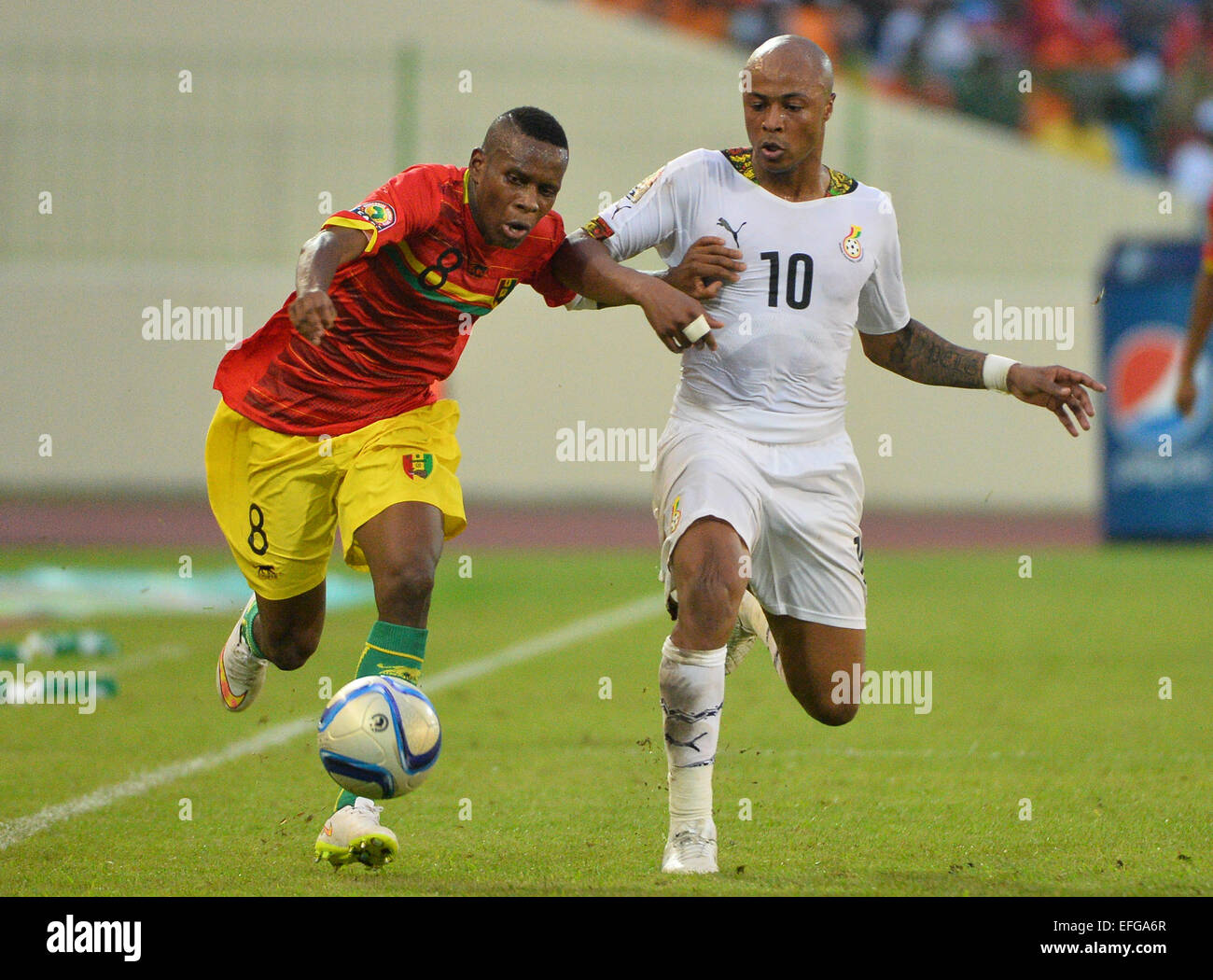 Equitorial Guine. 01st Feb, 2015. African Cup of Nations football tournament. Quarterfinals match between Euitorial Guinea versus Ghana. Ibrahima Traor&#xe9; ( Guinee ) and Andr&#xe9; Ayew ( Ghana ) Credit:  Action Plus Sports/Alamy Live News Stock Photo