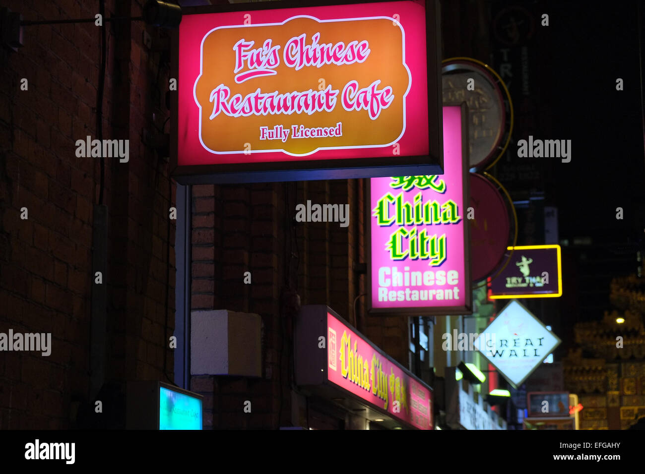 Neon restaurant signs for Chinese restaurants in Chinatown, Manchester. Stock Photo