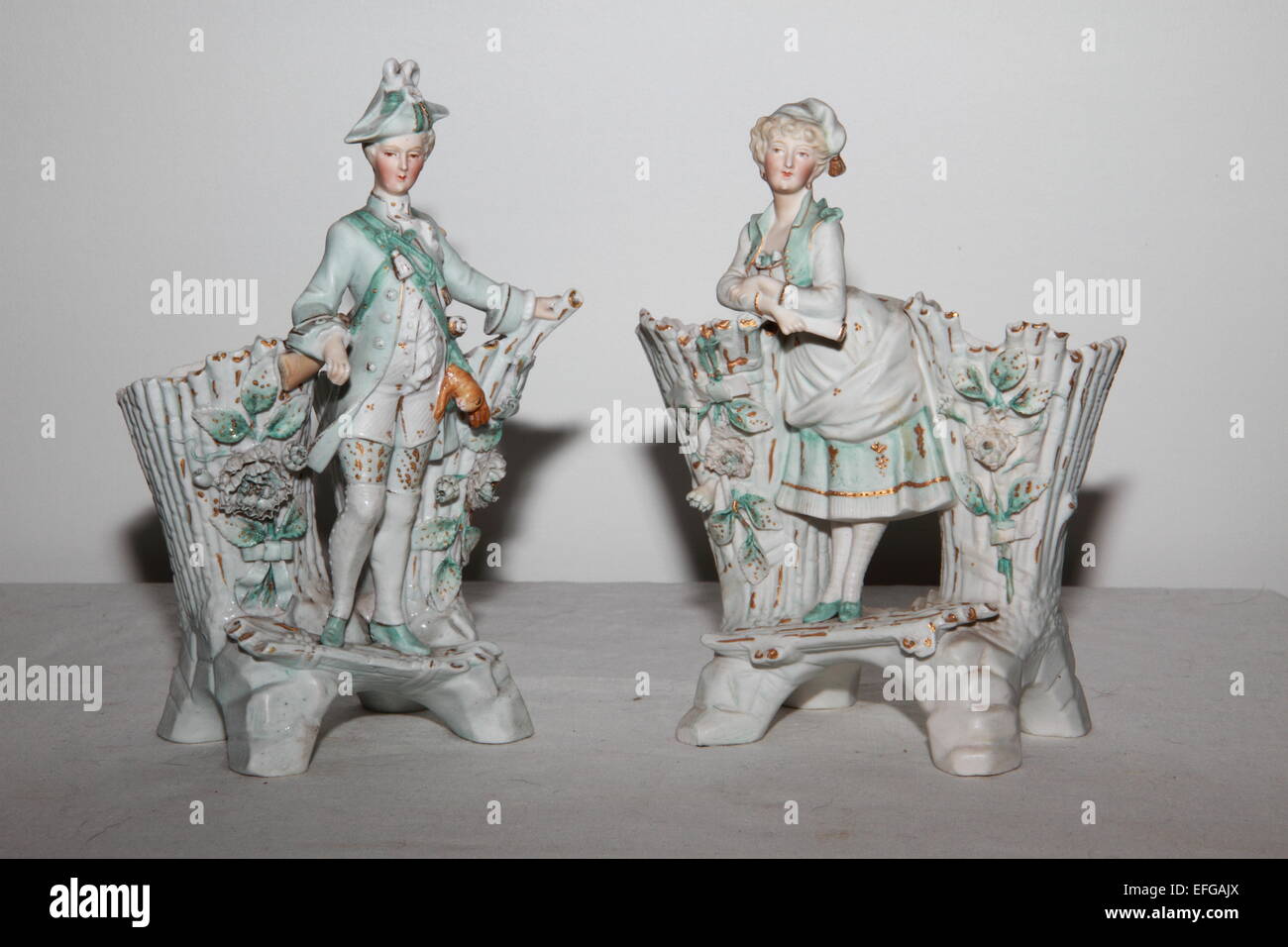 Two porcelain spill vases of a man and a woman Stock Photo