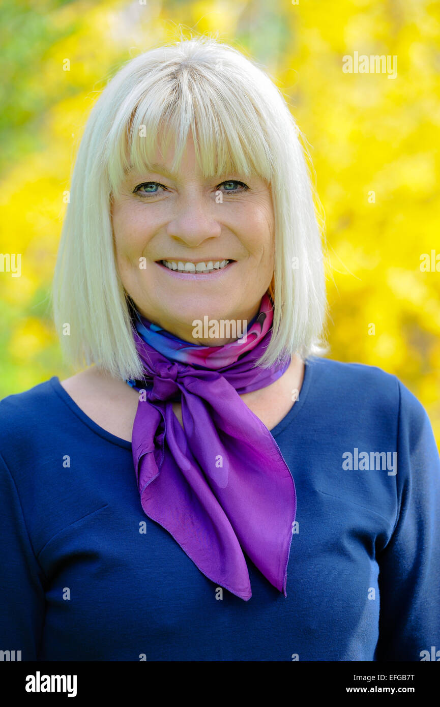 Portrait of a smiling senior woman Stock Photo - Alamy