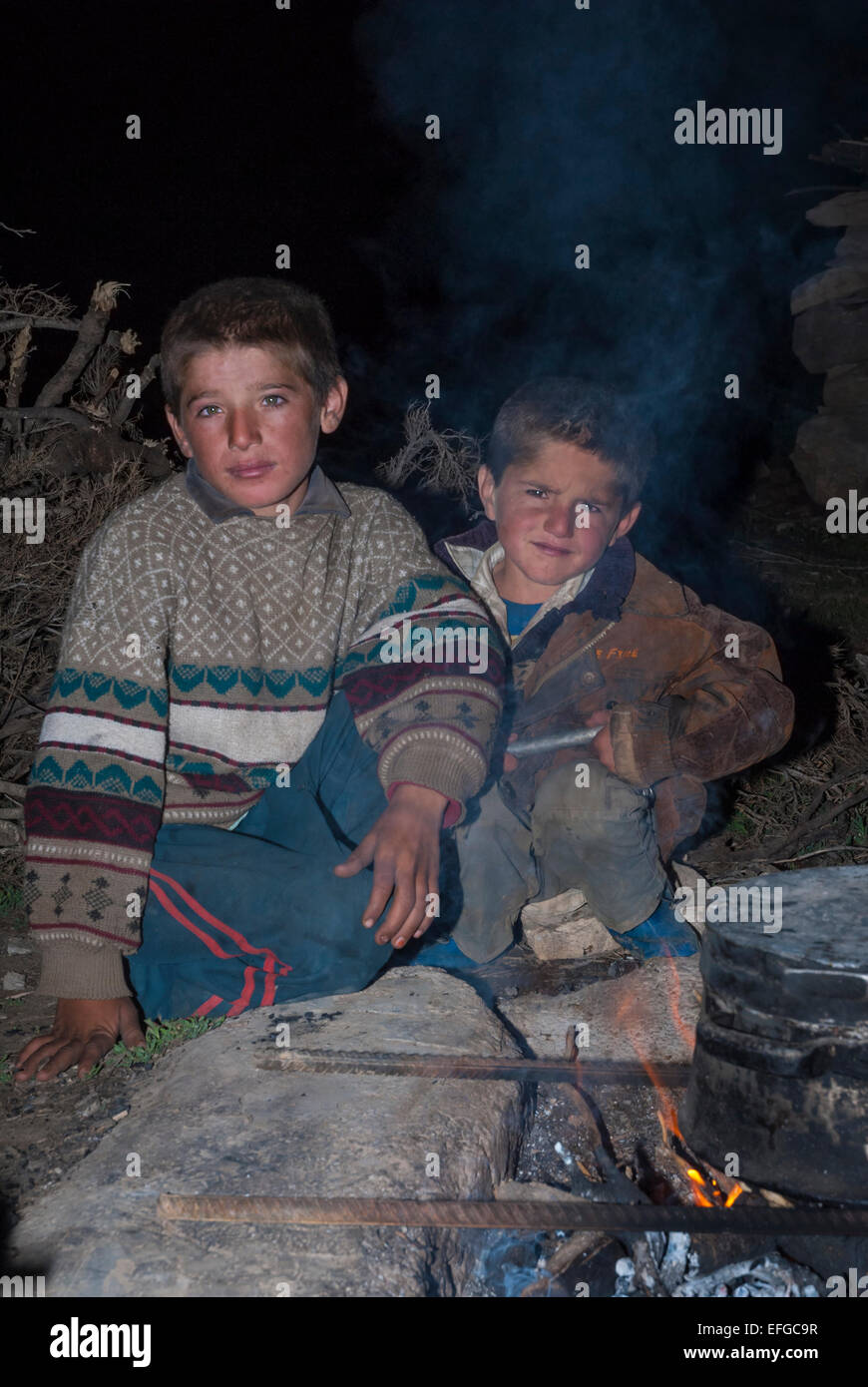 Bakhtiari boys waiting for dinner. Stock Photo