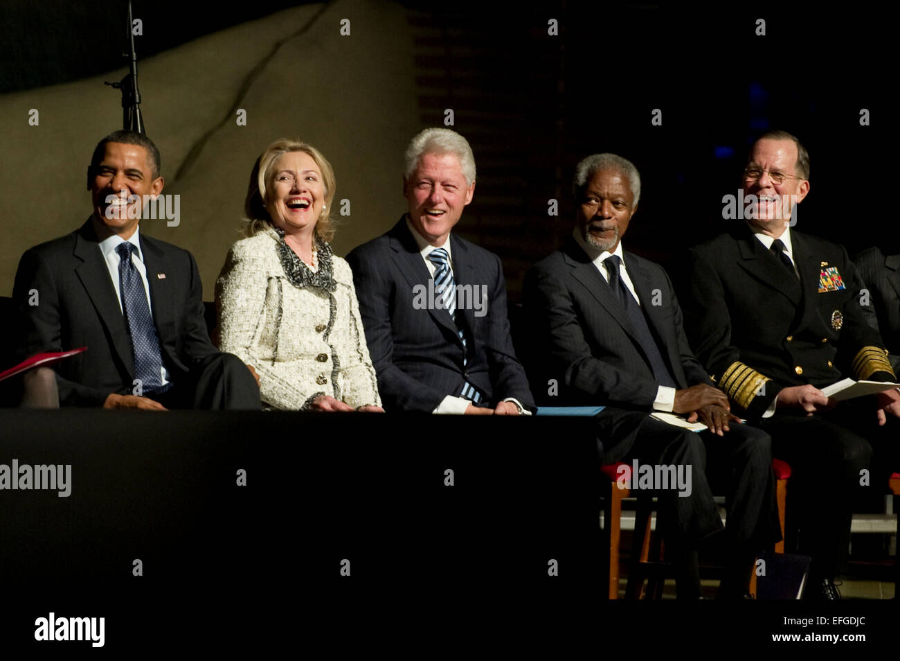 US President Barack Obama, Secretary of State Hillary Clinton, President Bill Clinton, former United Nation Secretary General Kofe Annan and U.S. Navy Adm. Mike Mullen, chairman of the Joint Chiefs of Staff share a laugh during the memorial service for Ambassador Richard C. Holbrooke at the John F. Kennedy Center for Performing Arts January 14, 2011 in Washington, DC. Holbrooke, the Special Envoy to Afghanistan and Pakistan, died in December 2010 after a nearly 50 year career in foreign service. Stock Photo