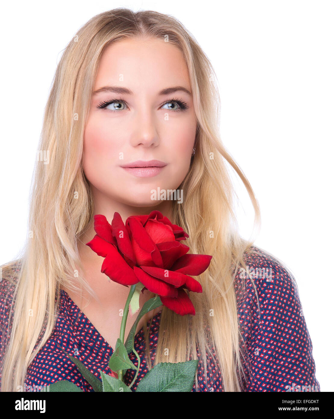 Closeup portrait of pretty girl with fresh red rose isolated on white background, happy Valentine day, love and romance concept Stock Photo