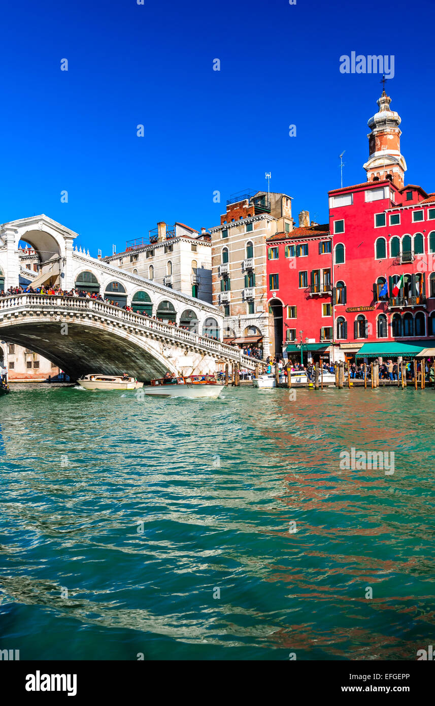 Image with Ponte di Rialto in Venice. Rialto Bridge is oldes of the four bridges spanning the Grand Canal in Venice, Italy. Stock Photo