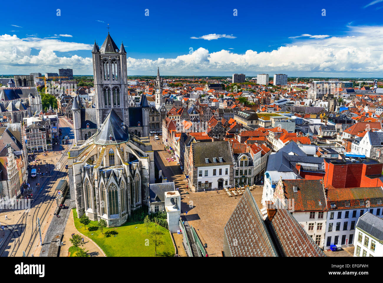 Skyline of Gent, Ghent in West Flanders, Belgium, seen from Belfort tower with St. Nicholas Church. Stock Photo