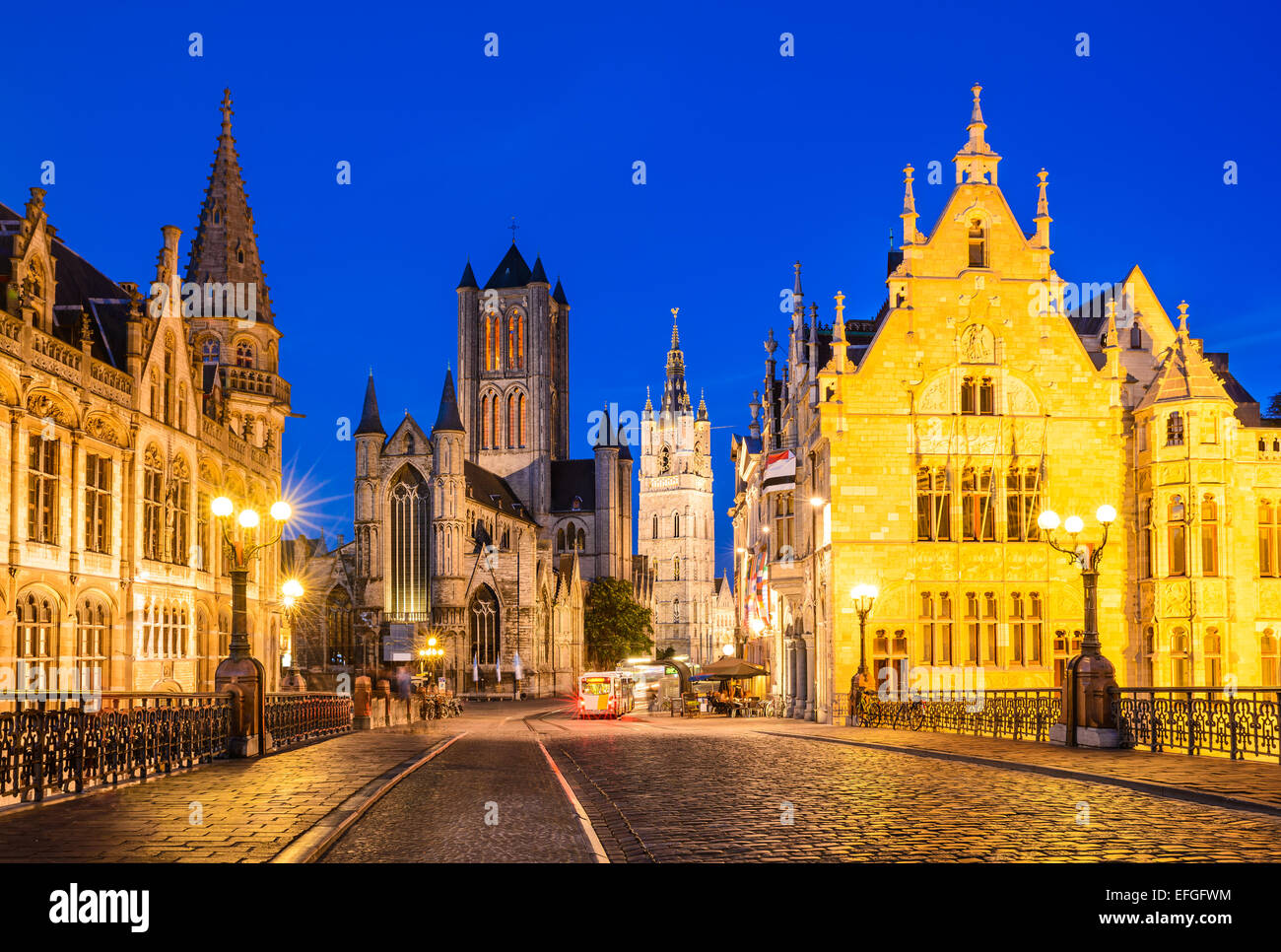 Night image of Saint Nicholas Church and Belfry tower, one of famous landmarks of Ghent, Gent in Flanders, Belgium. Stock Photo