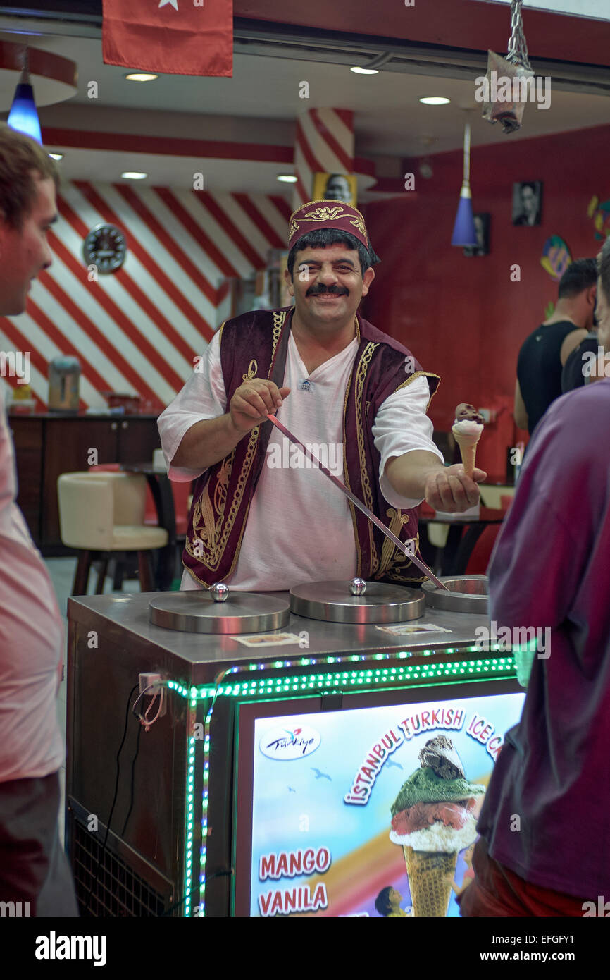 Turkish ice cream (Dondurma) vendor serving customers Stock Photo