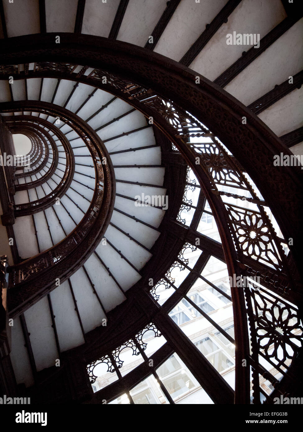 The brilliant oriel staircase at The Rookery, one of the most historically significant buildings in Chicago, Illinois. Stock Photo