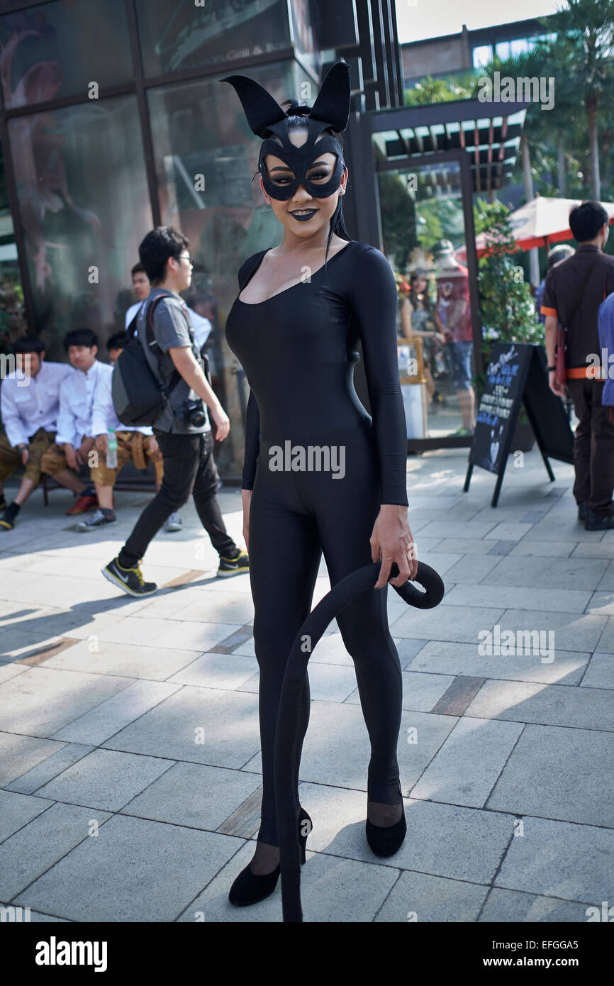 Thailand transsexual dressed as Cat Woman at a street parade. Pattaya Thailand S.E. Asia Stock Photo