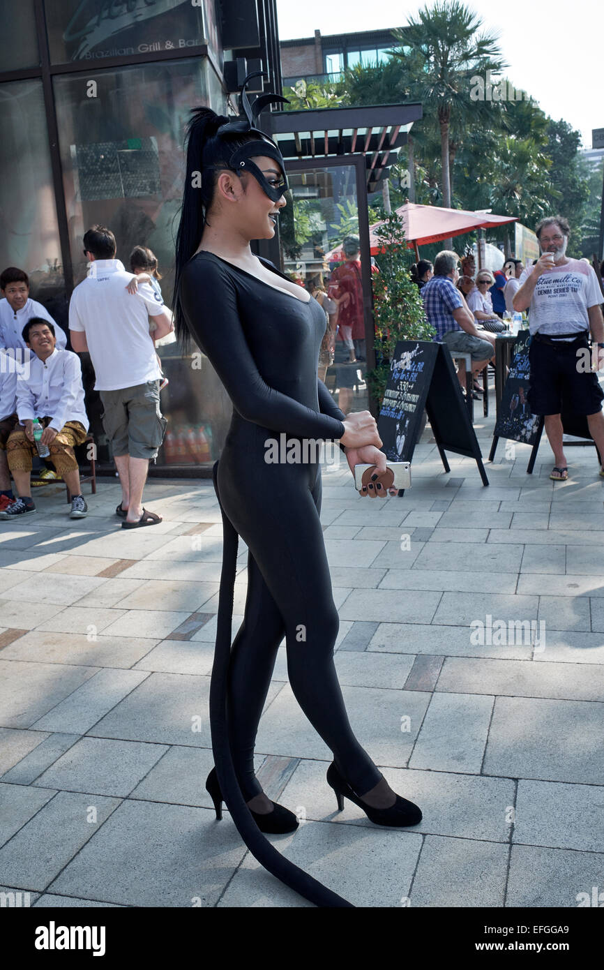 Thailand transsexual dressed as Cat Woman at a street parade. Pattaya Thailand S.E. Asia Stock Photo