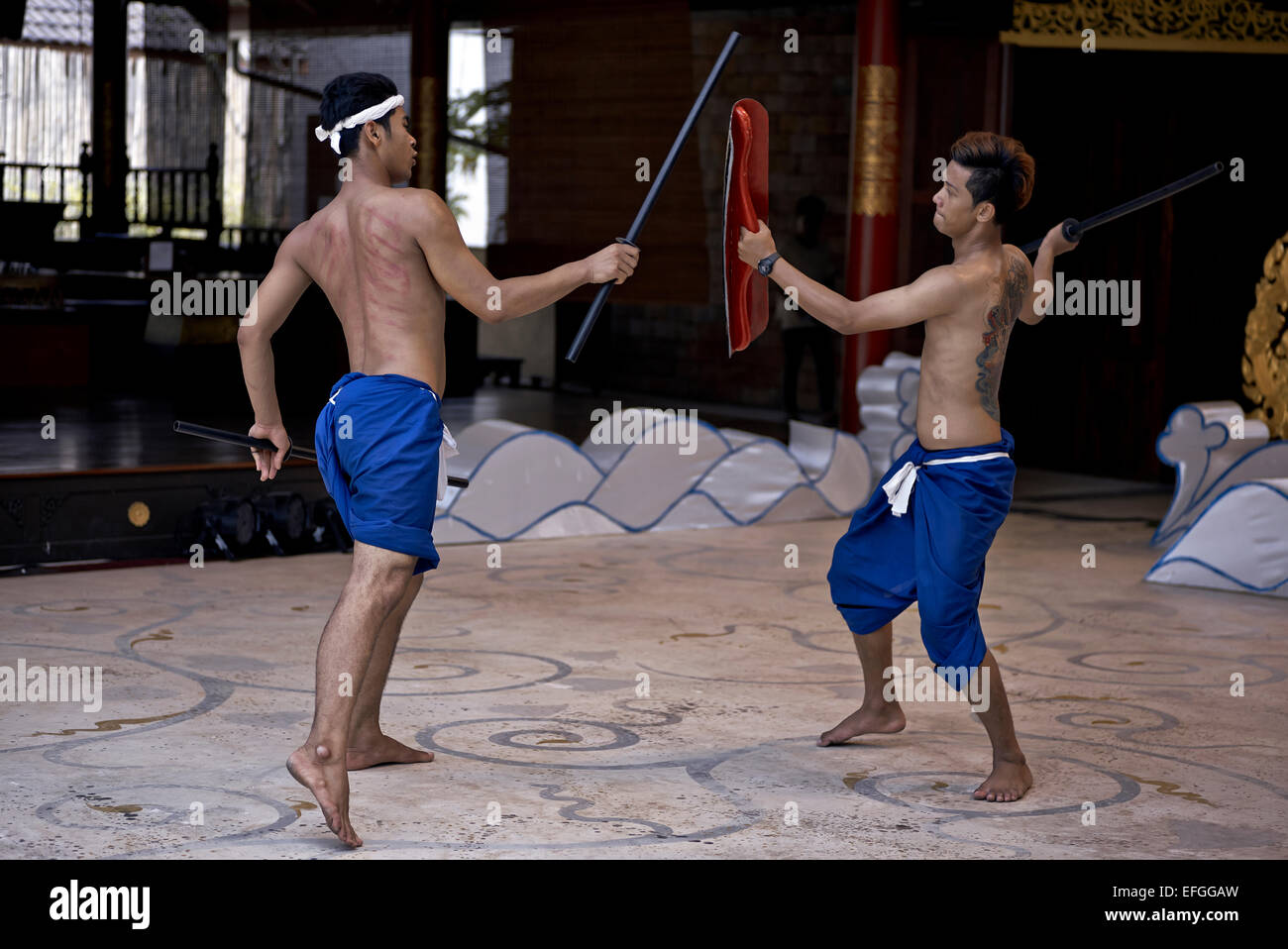 Stick fighting Thailand with participants practicing the ancient martial art of Krabi Krabong stick fighting. Thailand S. E. Asia Stock Photo