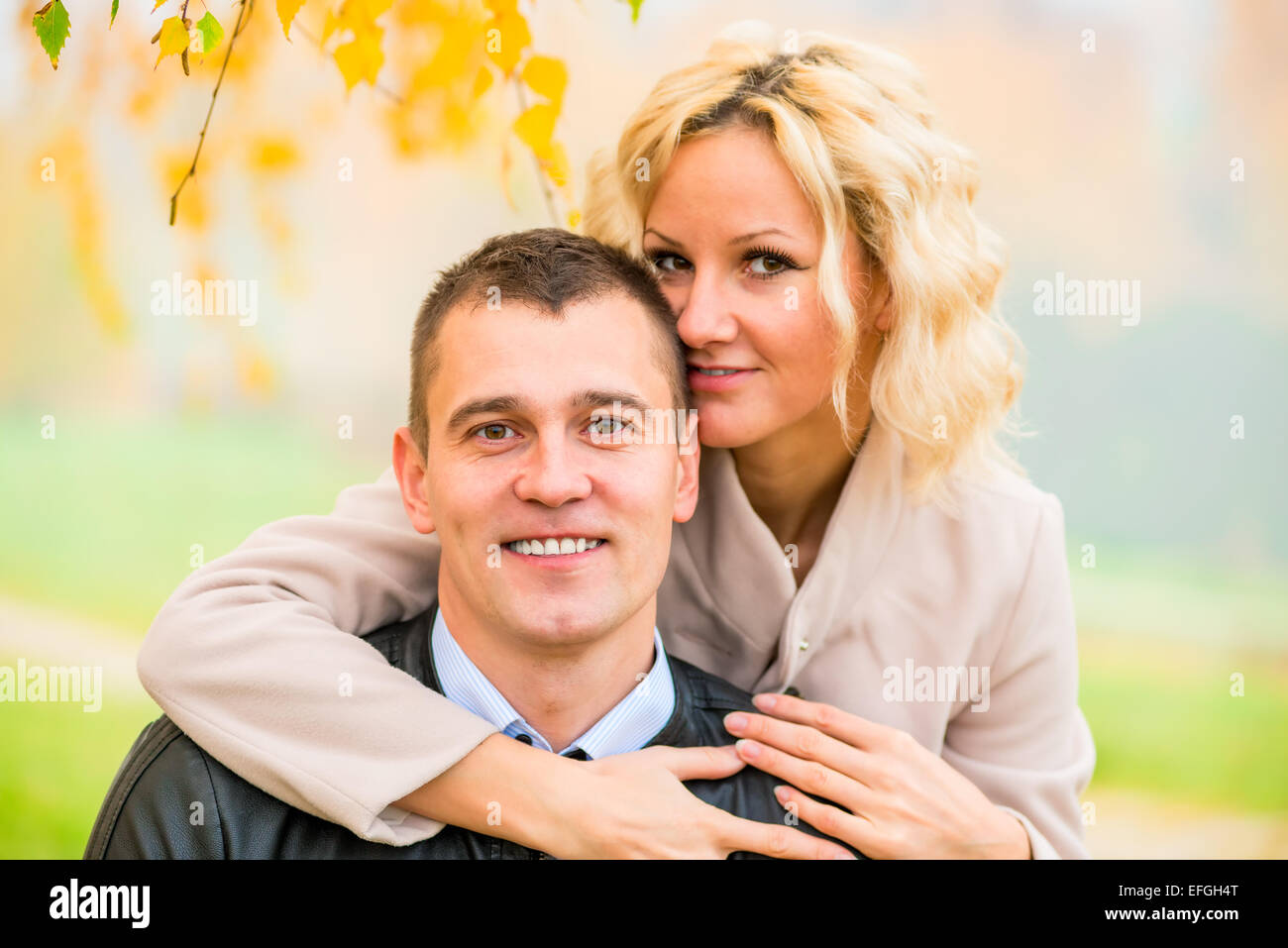 portrait of happy young love couple on nature Stock Photo