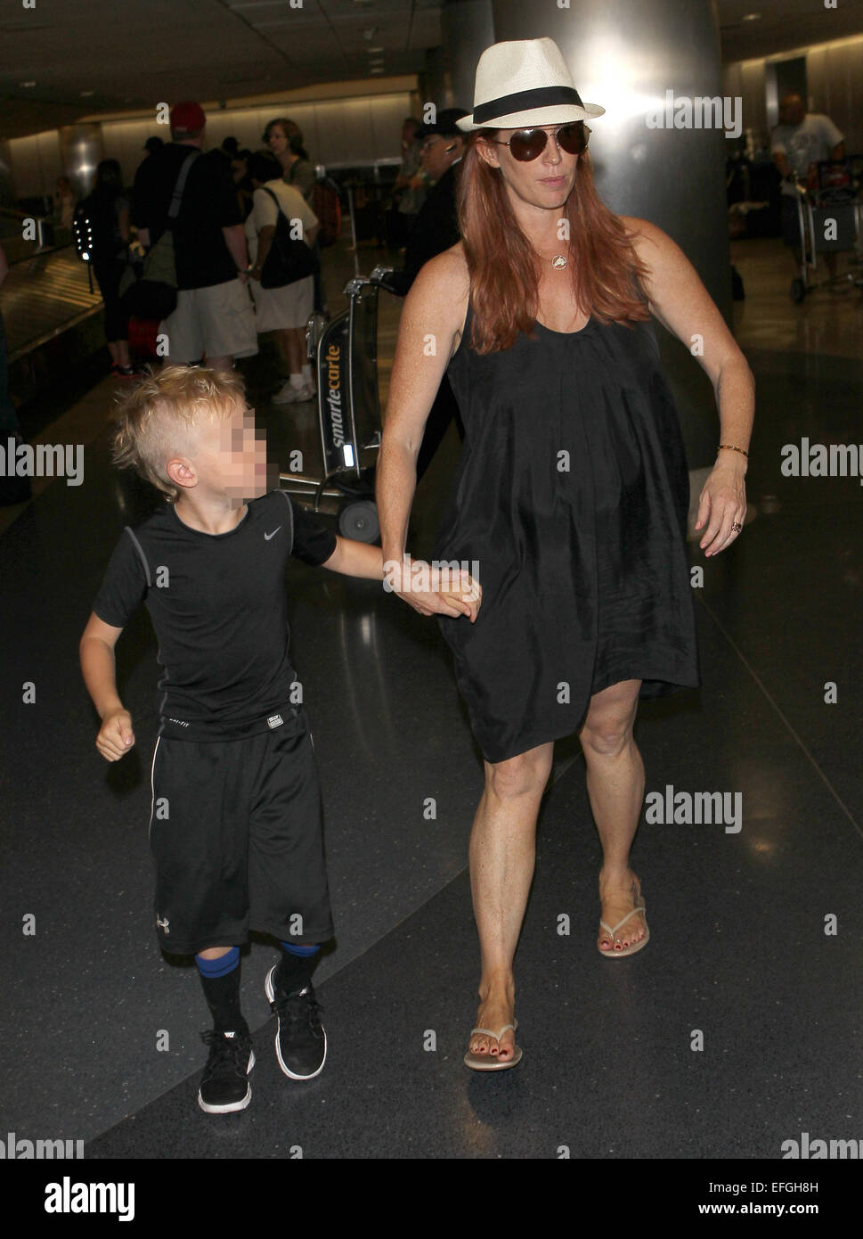 Poppy Montgomery arrives at Los Angeles International (LAX) airport