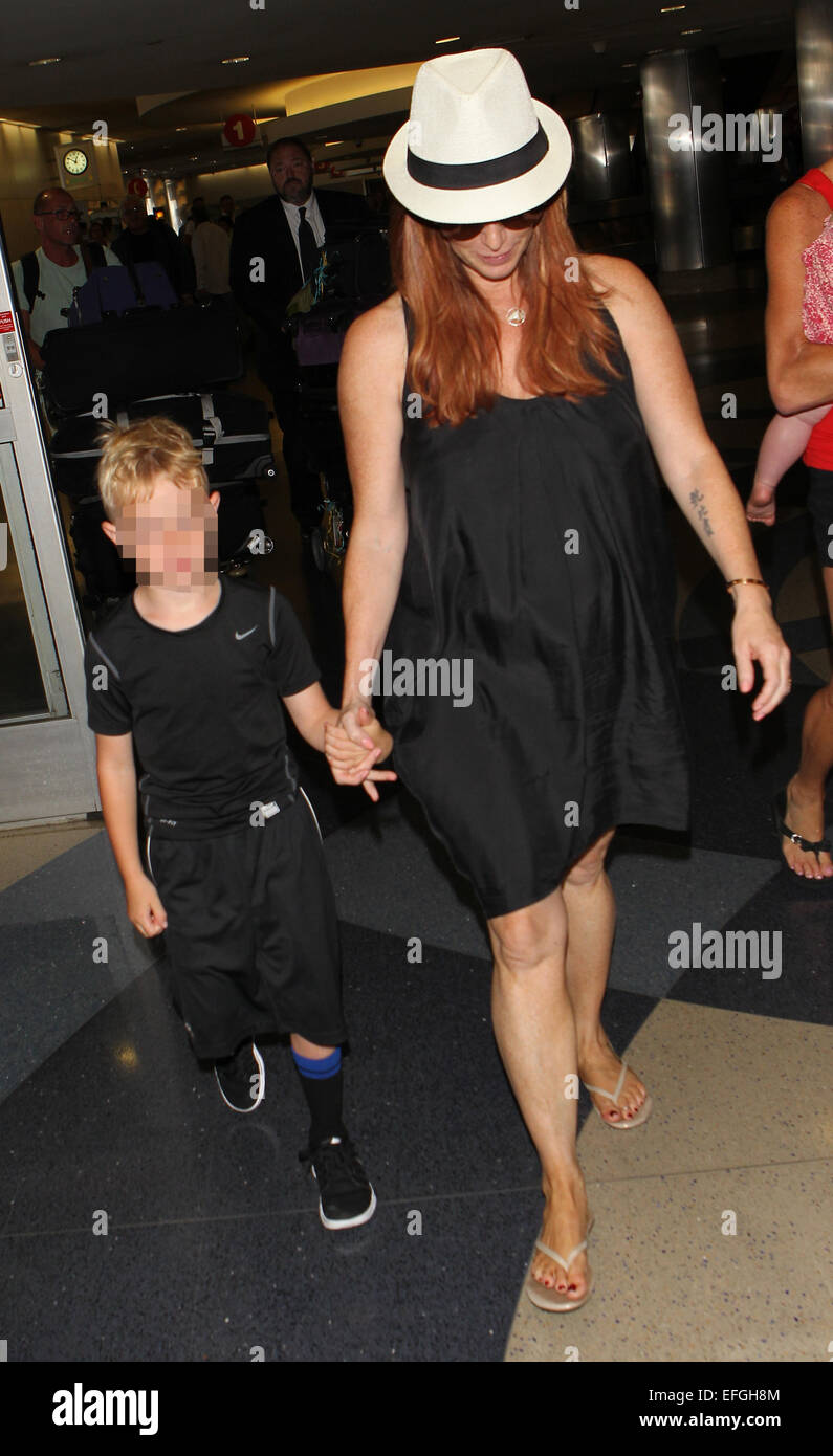 Poppy Montgomery arrives at Los Angeles International (LAX) airport