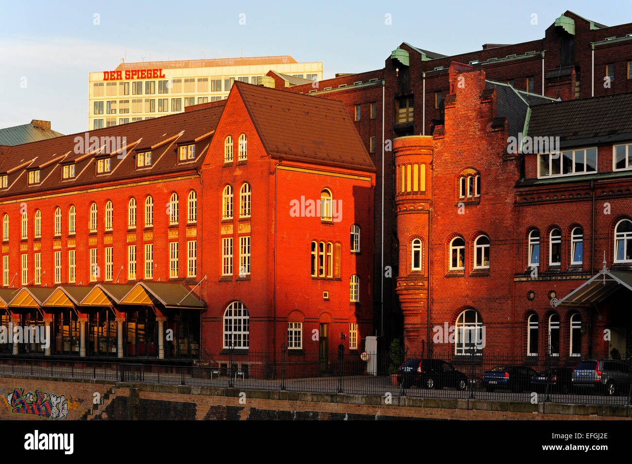 Brick buildings at Zollkanal, Speicherstadt, behind the Publishing house Der Spiegel, Hamburg, Germany Stock Photo