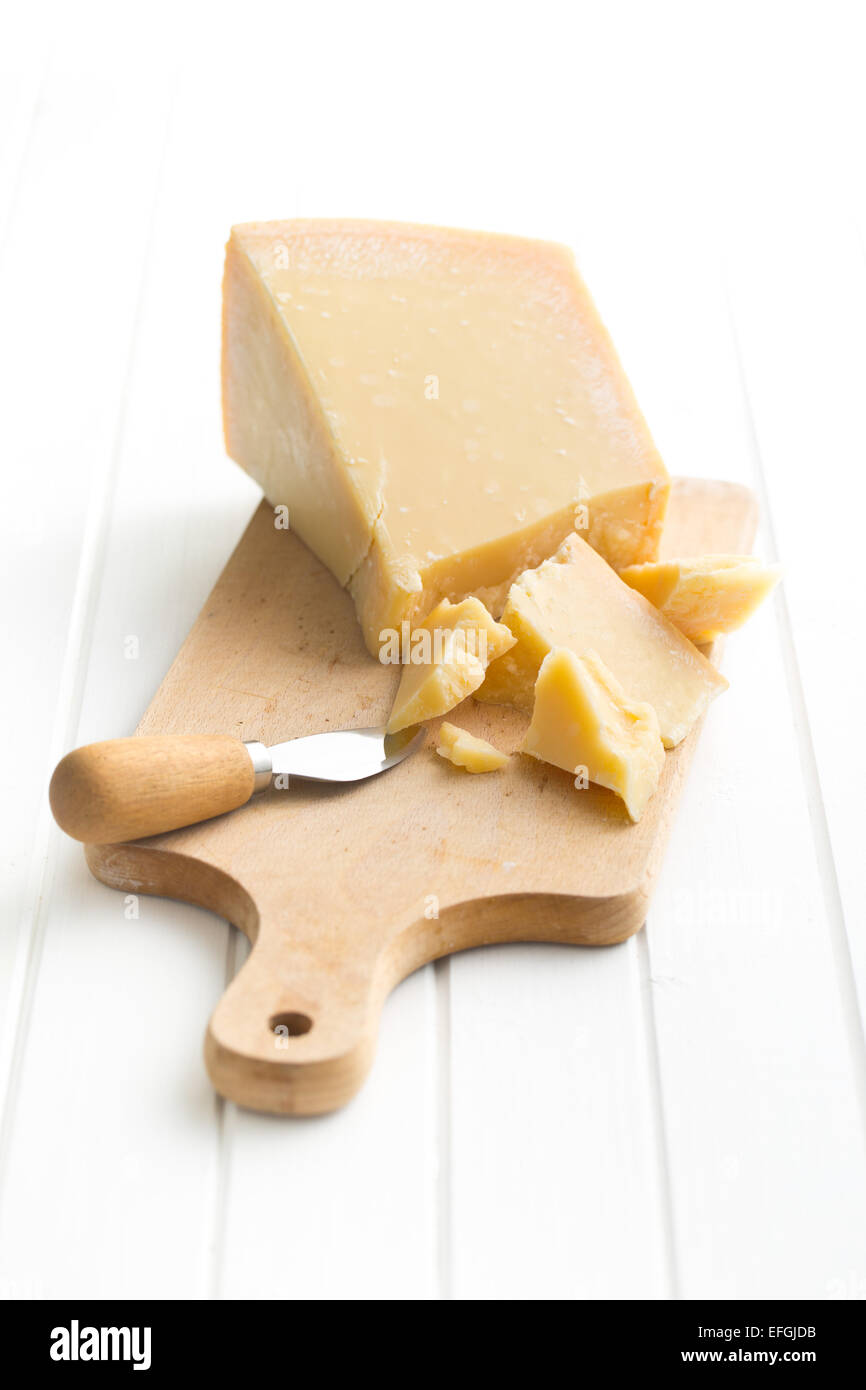 the parmesan cheese on cutting board Stock Photo