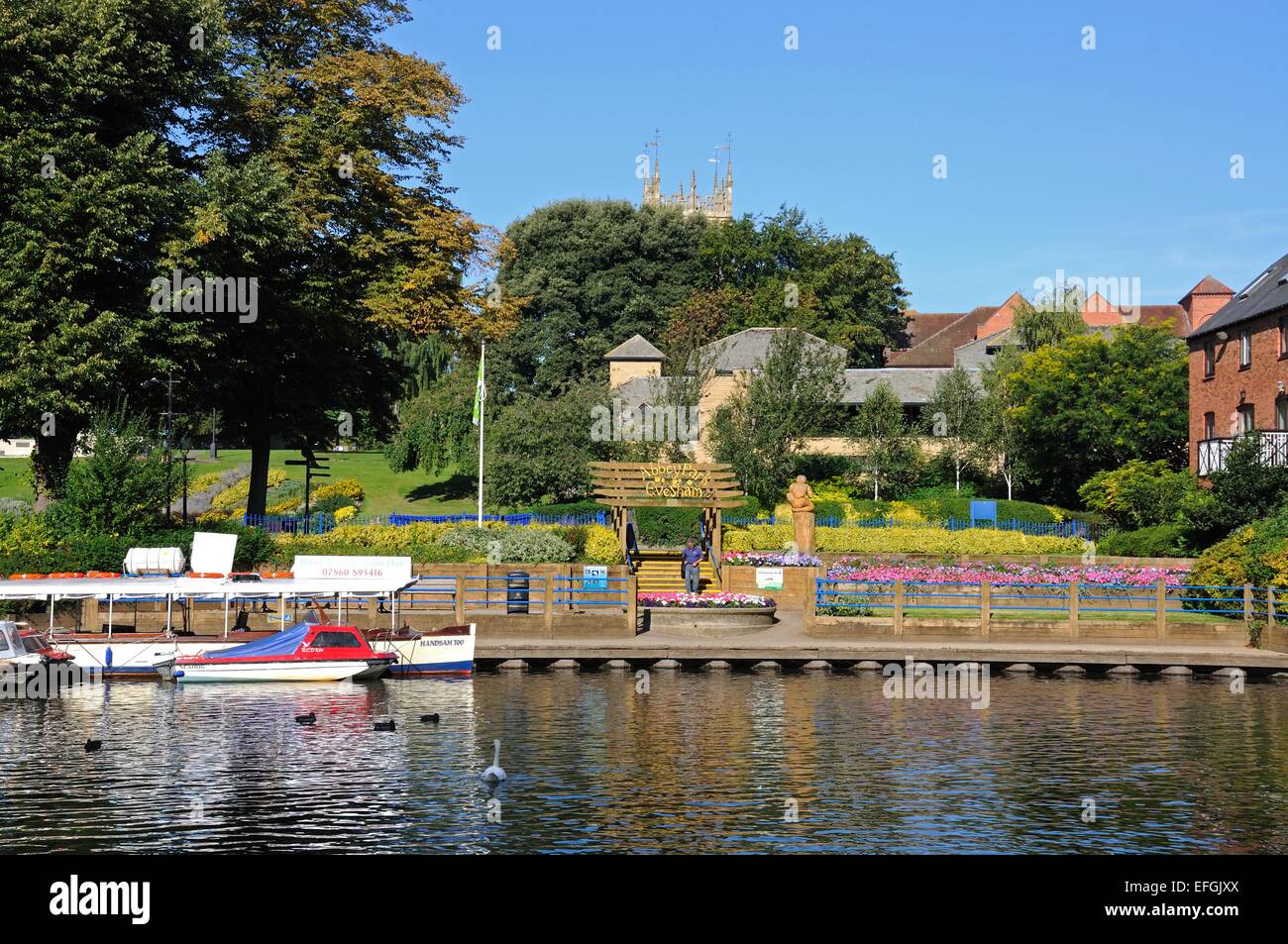 Boats moored along the River Avon with Abbey Park to the rear, Evesham
