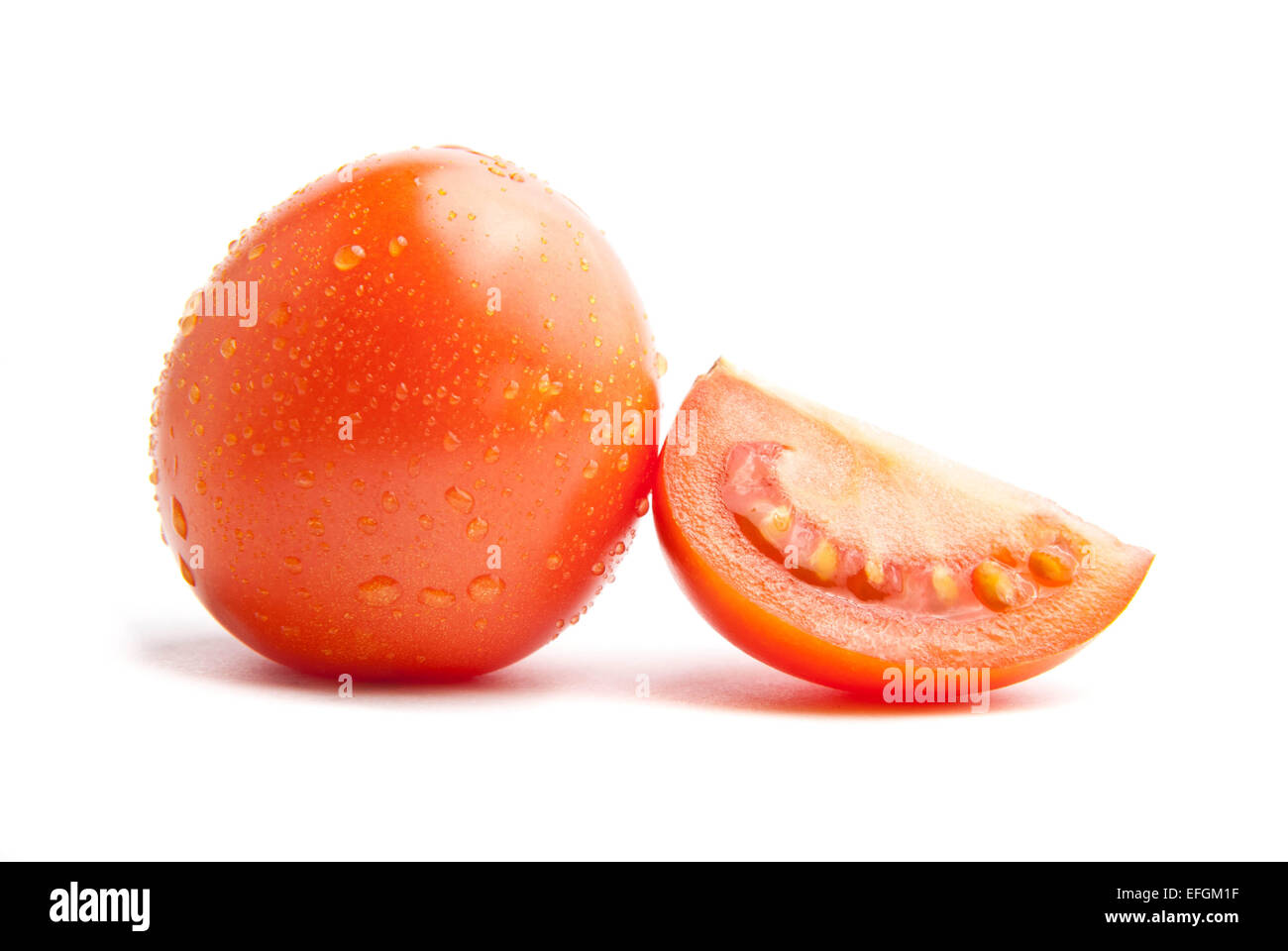 Tomato isolated on white background Stock Photo - Alamy